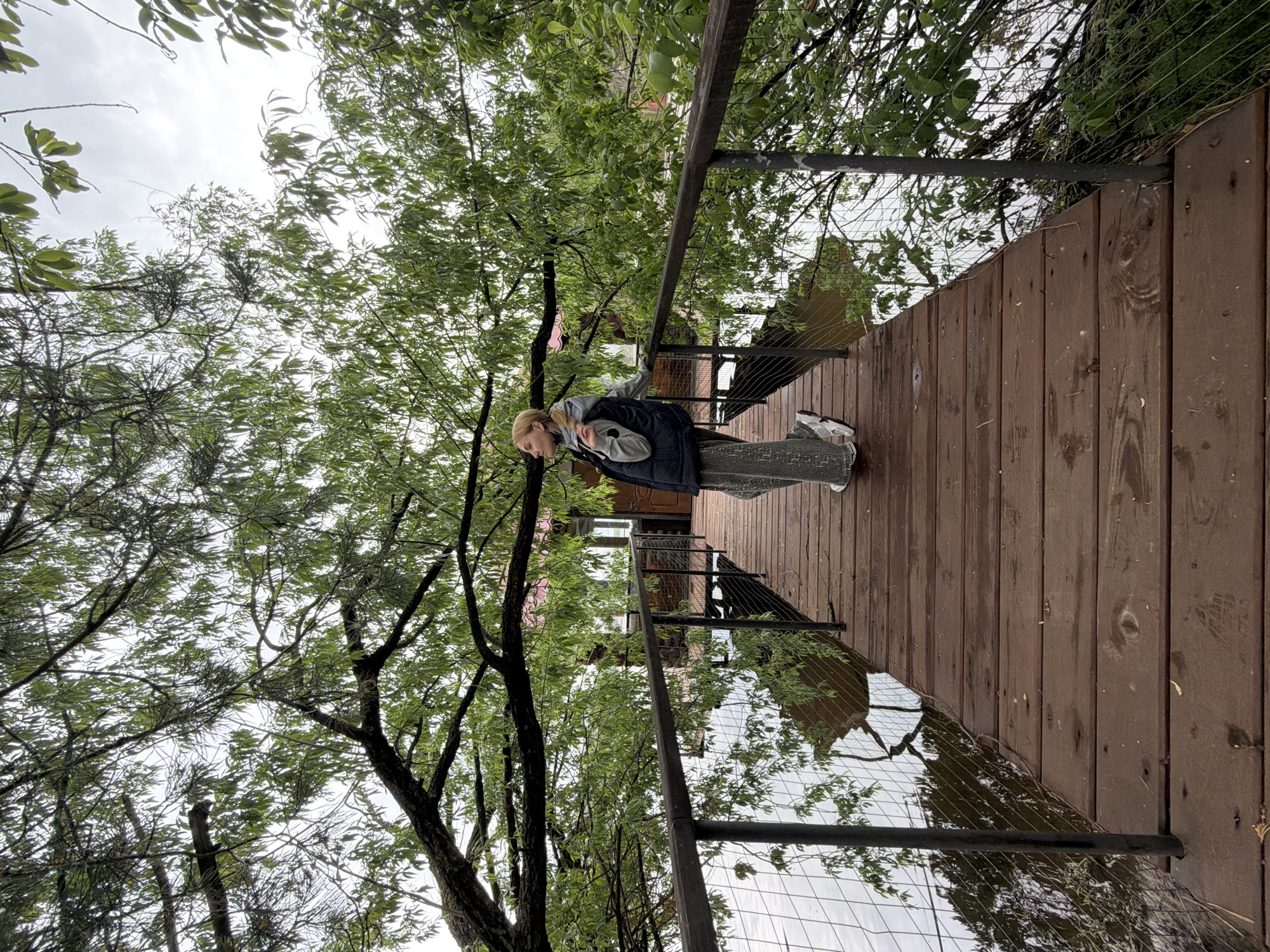 Woman visits lakeside recreational area in Chaykovsky, Russia