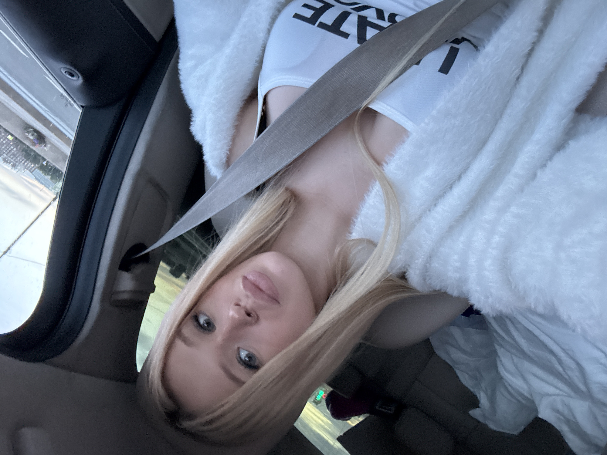 Passenger seat selfie duo, Saint Petersburg car interior