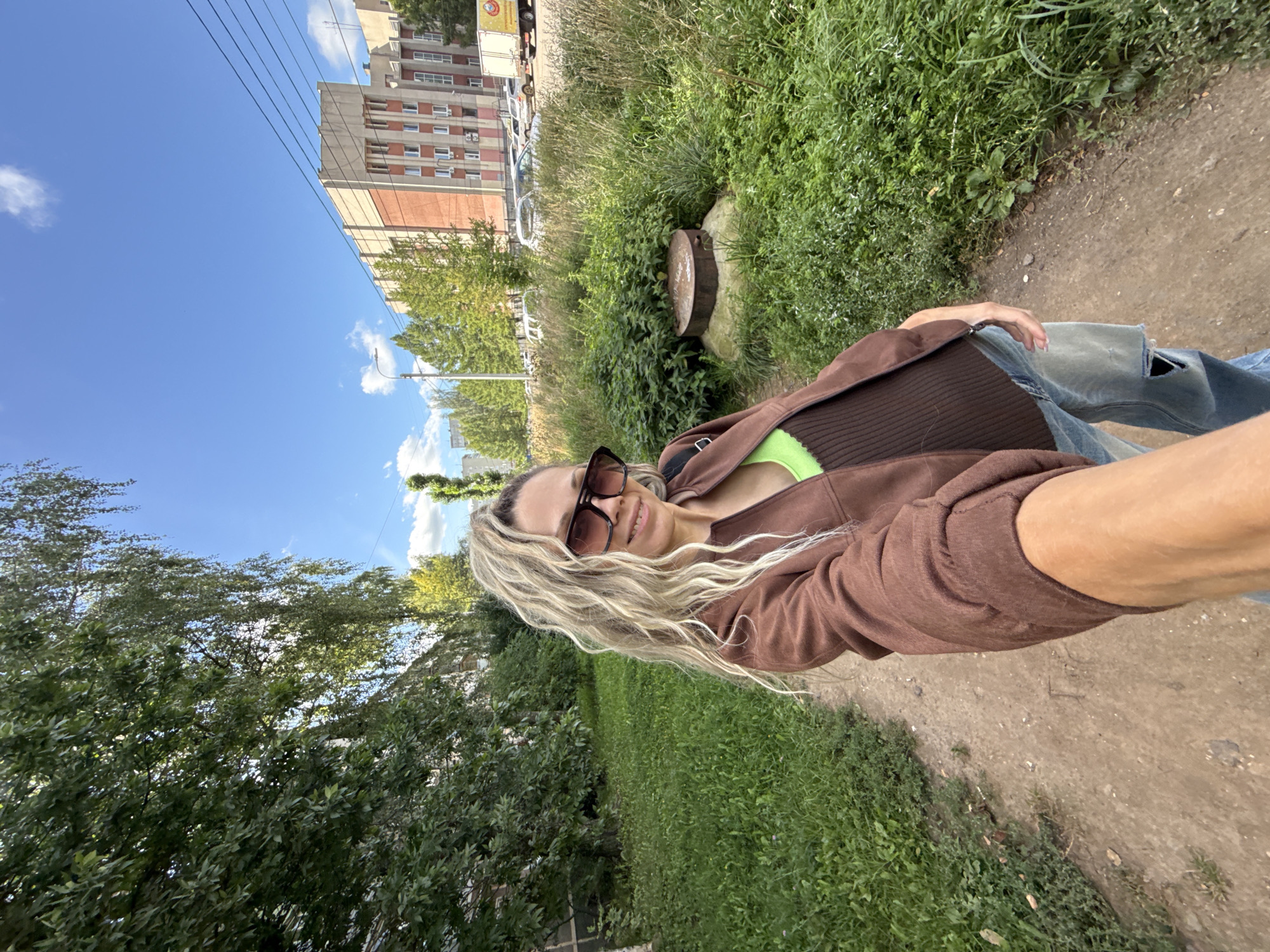 Selfies at a sunny outdoor market in Zhukovo, Russia