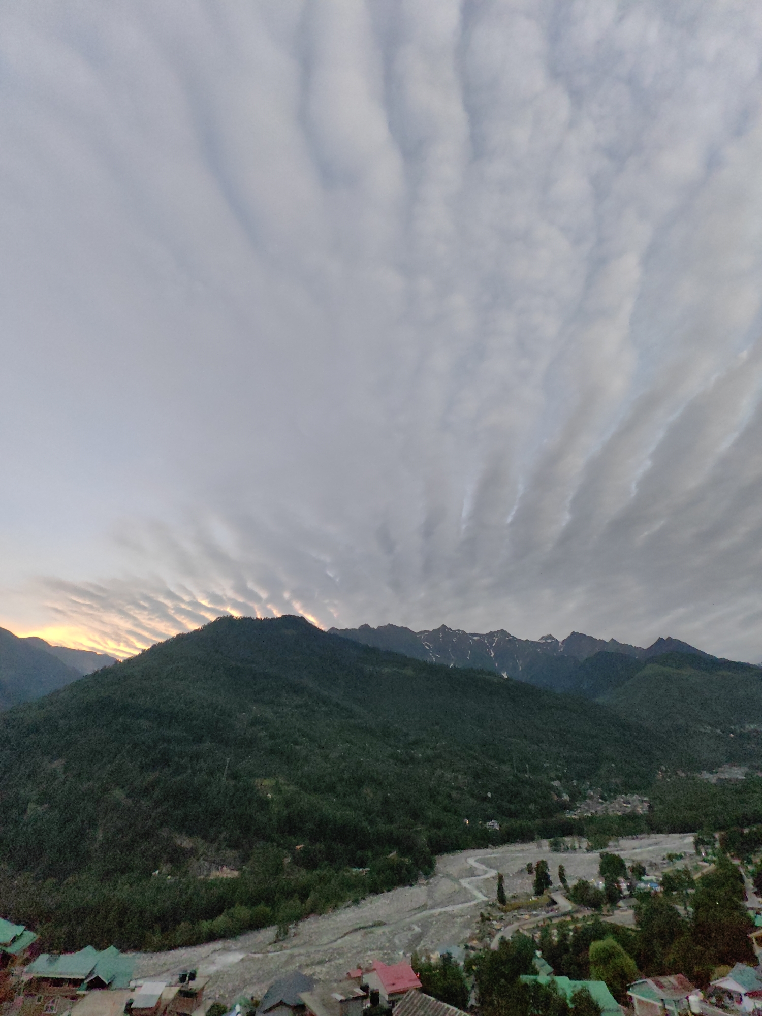 Dusk over Vashisht valley, Himalayas lit by dramatic cloud cover
