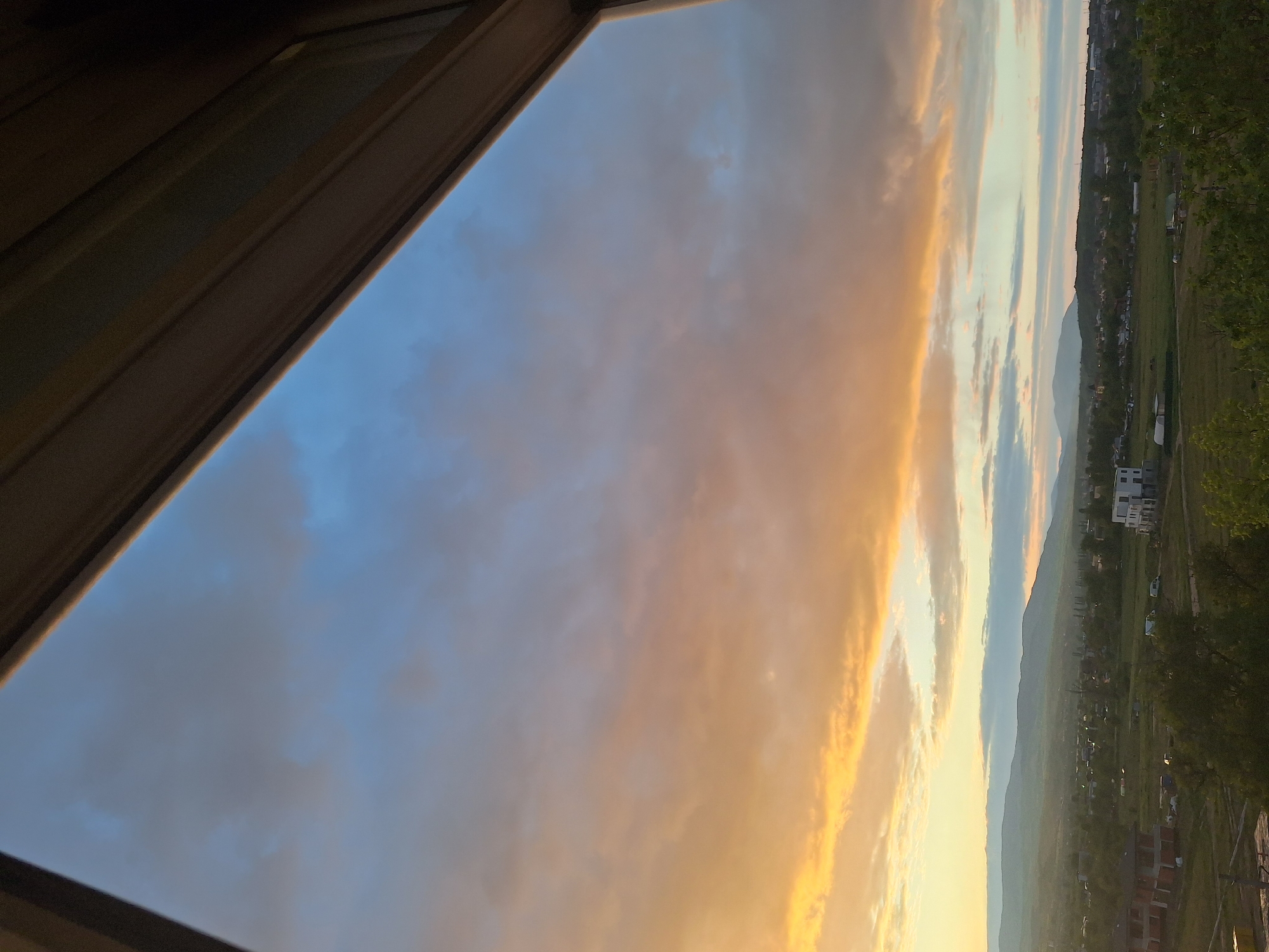 Sunset photographed from building overlooking Blagoevgrad mountains