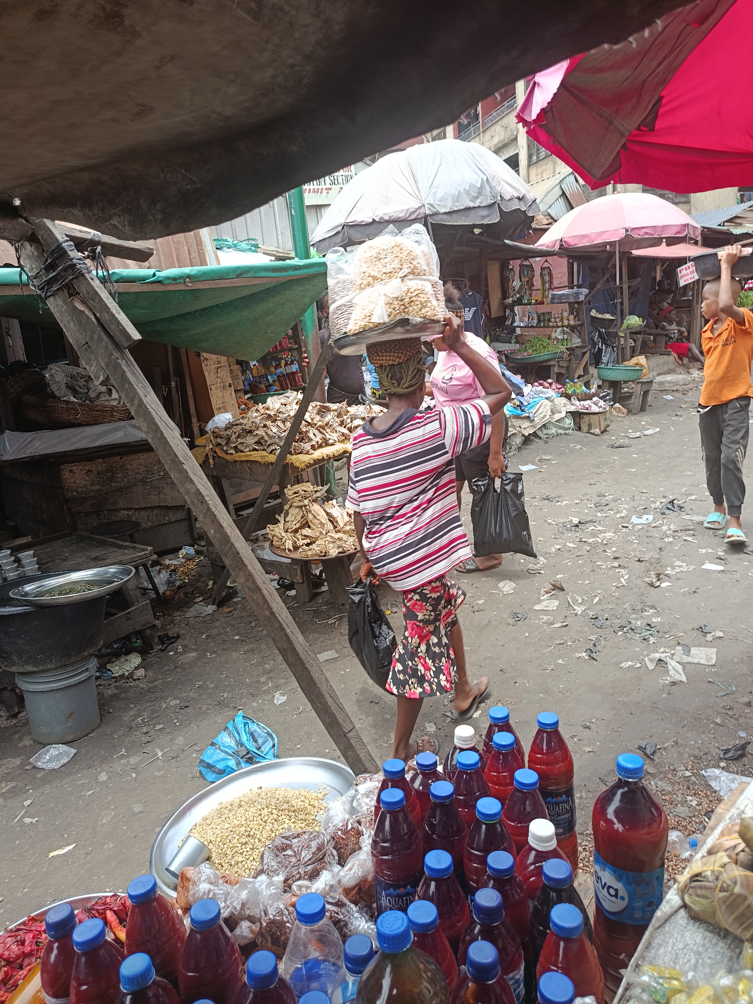 Marketplace vendors display goods in Nkpor, Nigeria