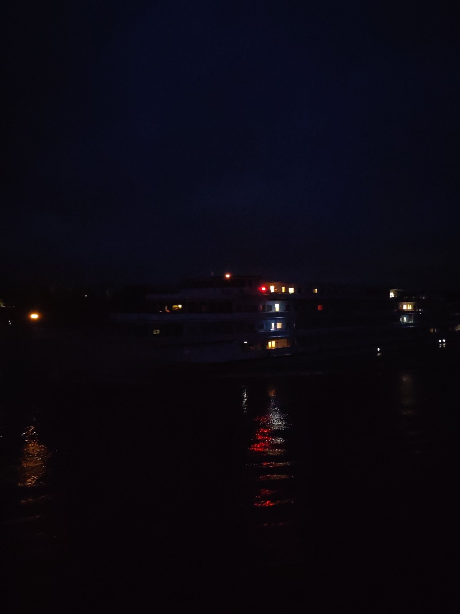 Nighttime waterfront scene captured in Golovino, Russia