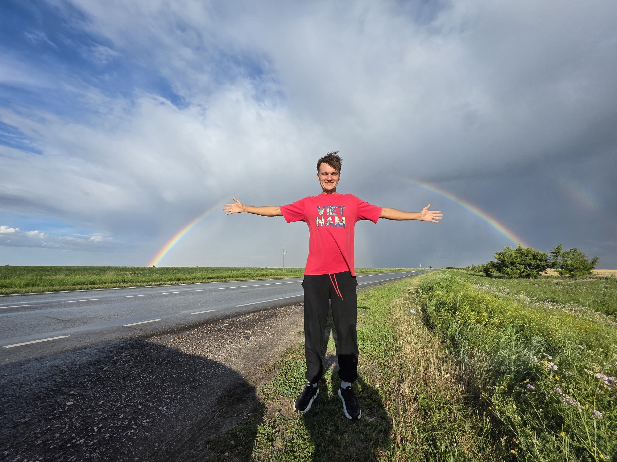 Double rainbow over Borodino fields, arms wide open