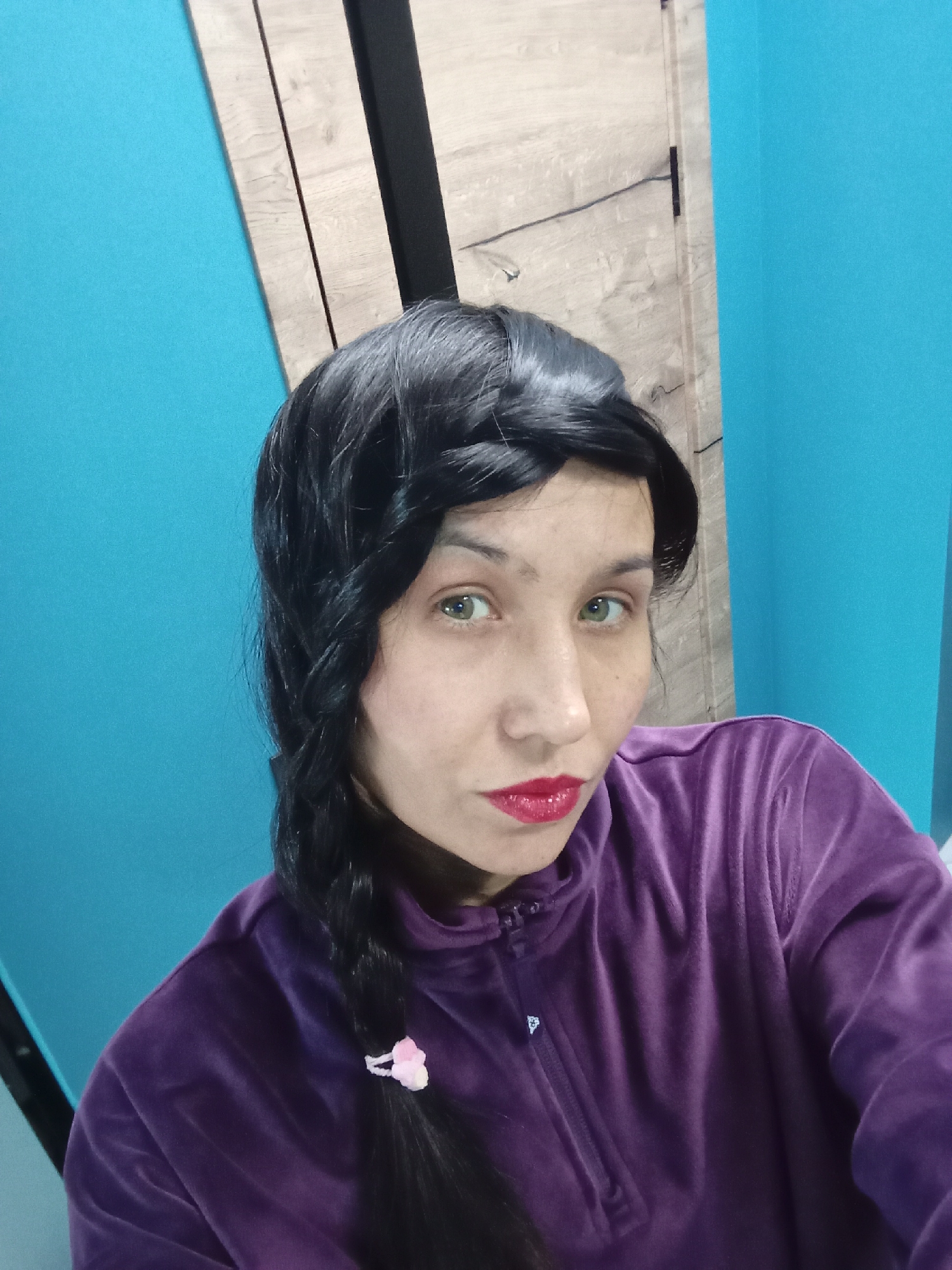 Woman in purple hoodie observed in Pervomaysky, Russia