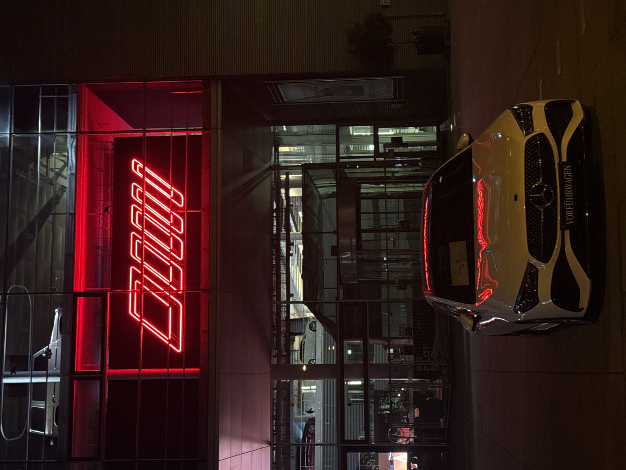 Mercedes demonstration car parked at Munich dealership at night