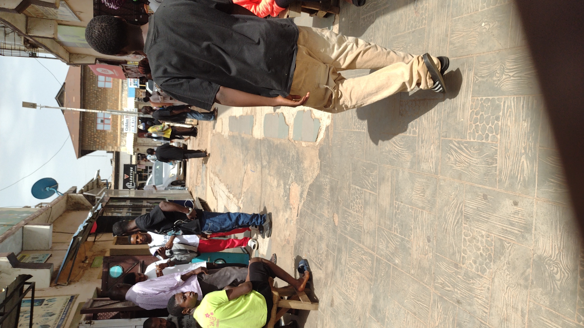 Ordinary street life documented across Jos, Nigeria during midday