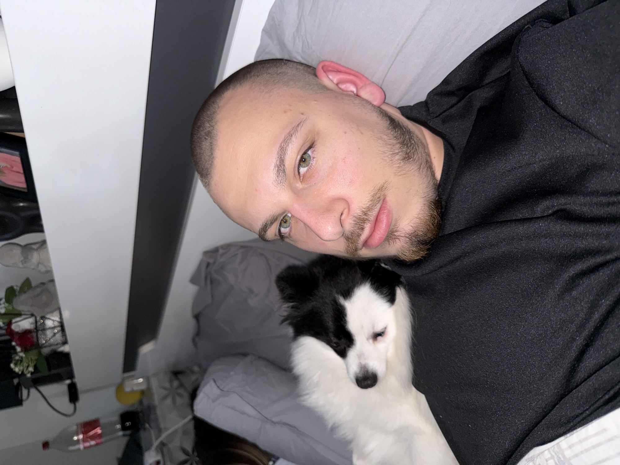 Man and dog share quiet bedtime moment in Bulgaria
