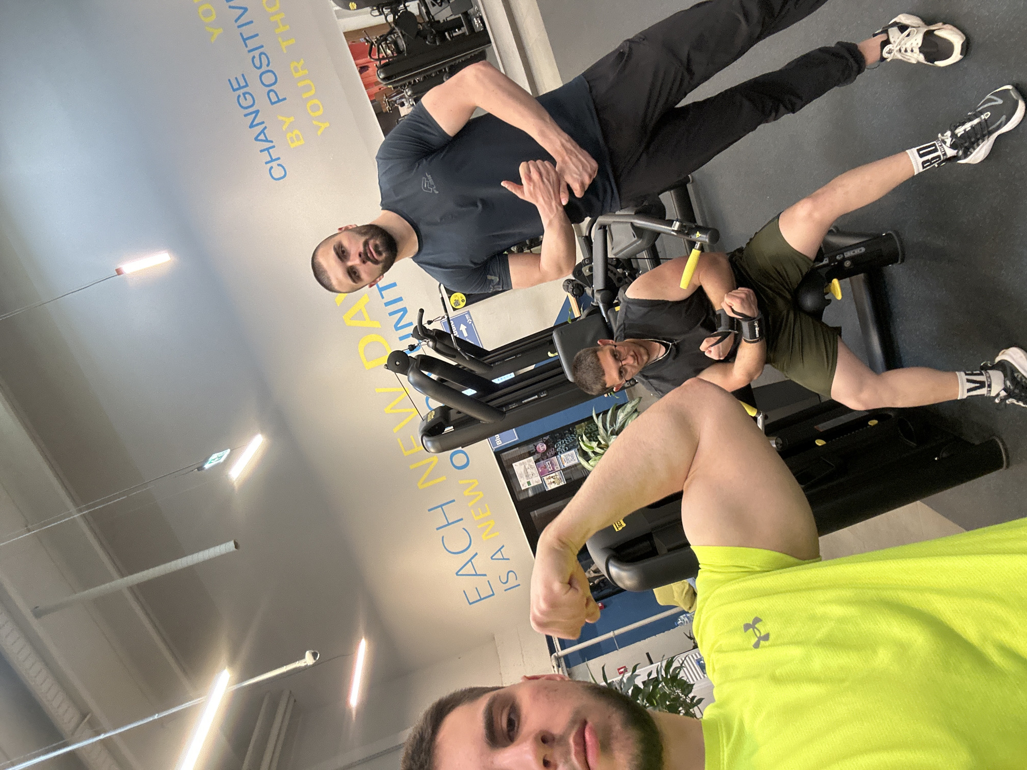 Men pose and exercise at Sofia gym