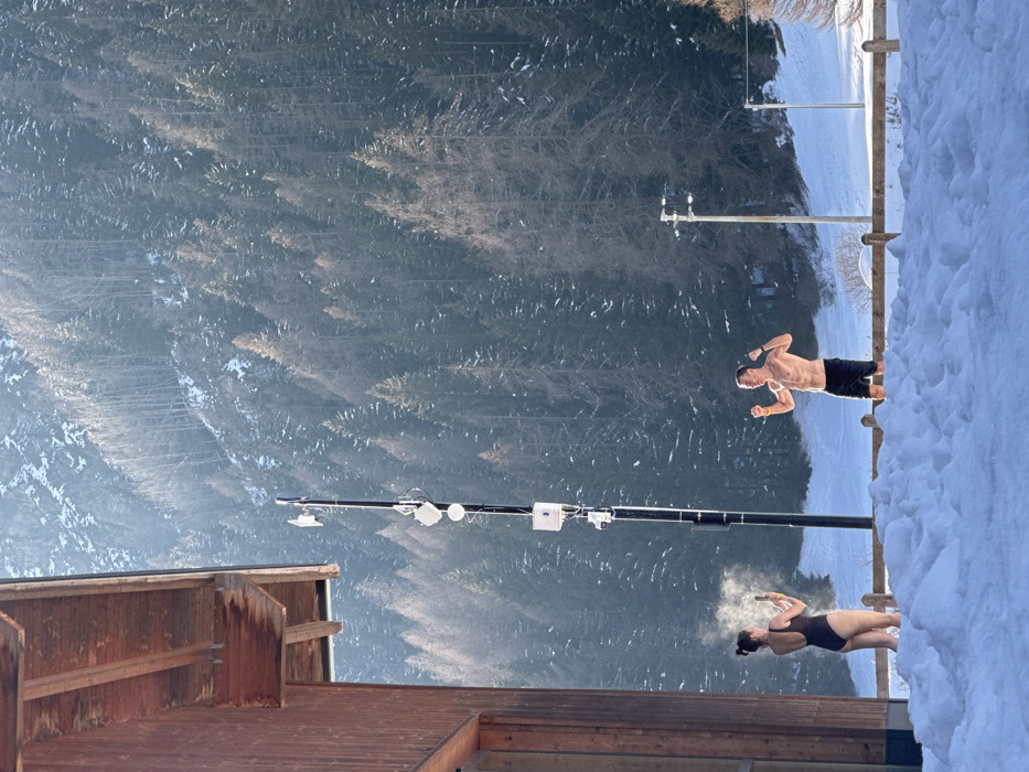 Winter hot tub scenes captured in Italian Alpine resorts