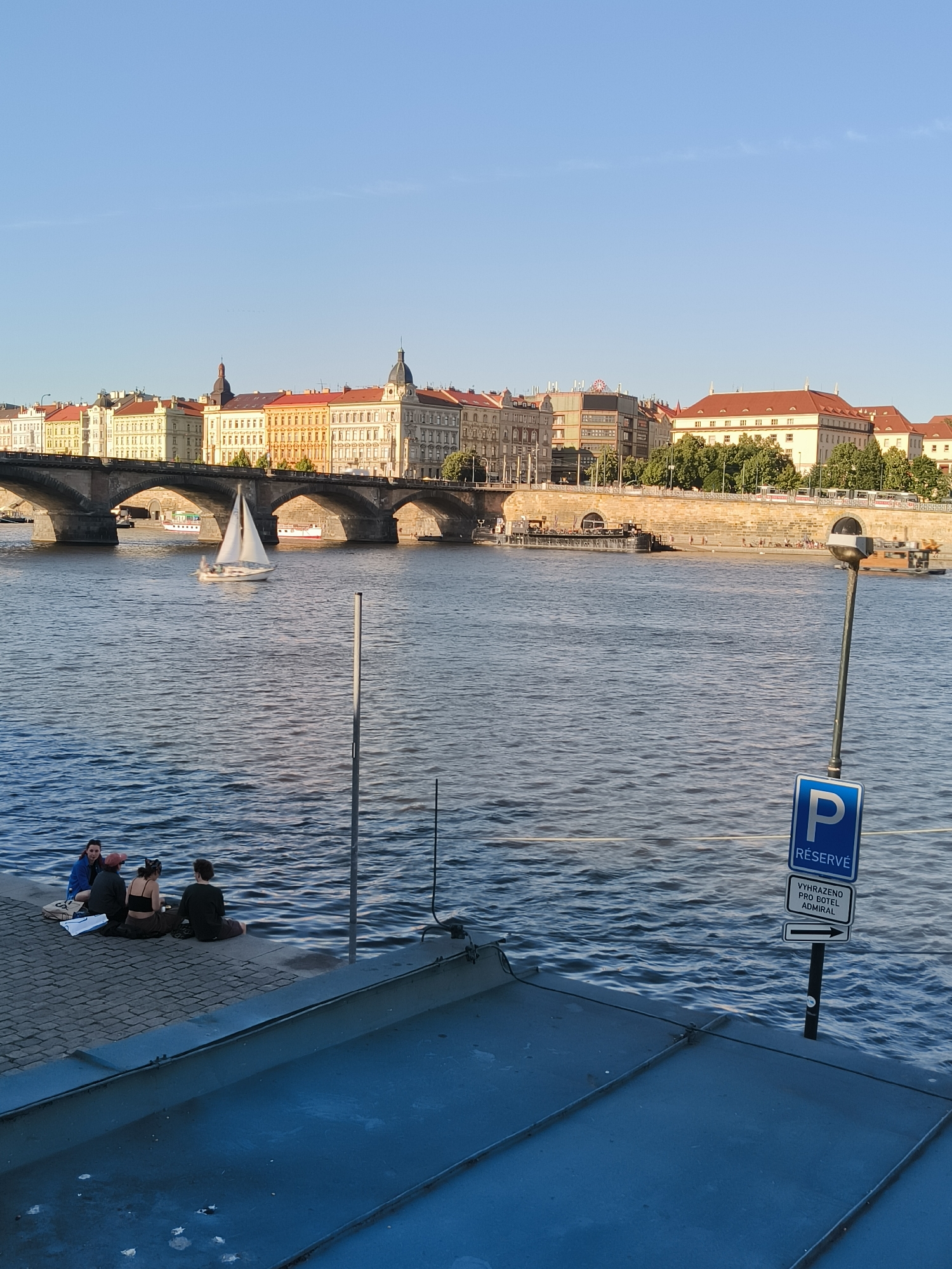 Vltava River and arched bridge in the Prague cityscape