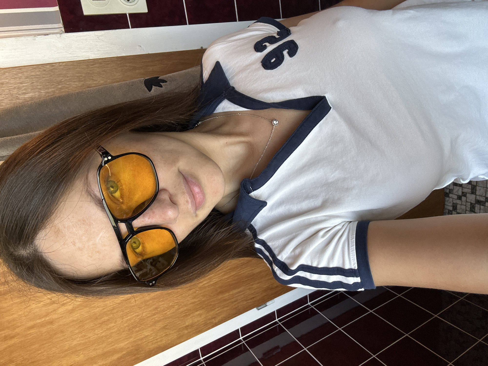 Woman takes bathroom selfies in Fredenbeck, Germany