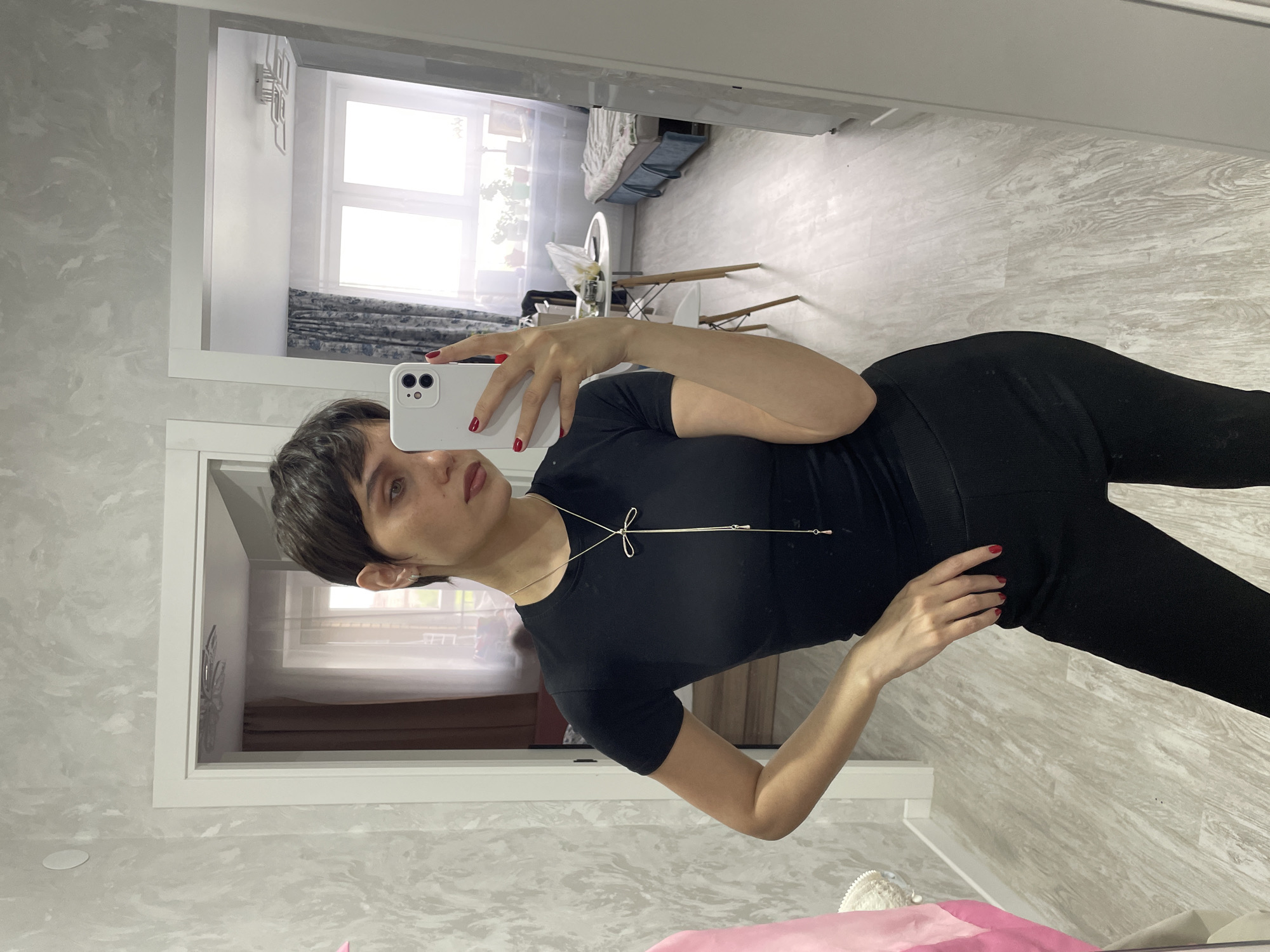 Woman takes morning selfies in Izhevsk home