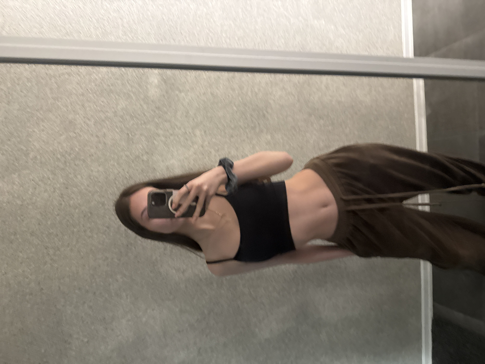 Woman takes mirror selfie in Sofia apartment