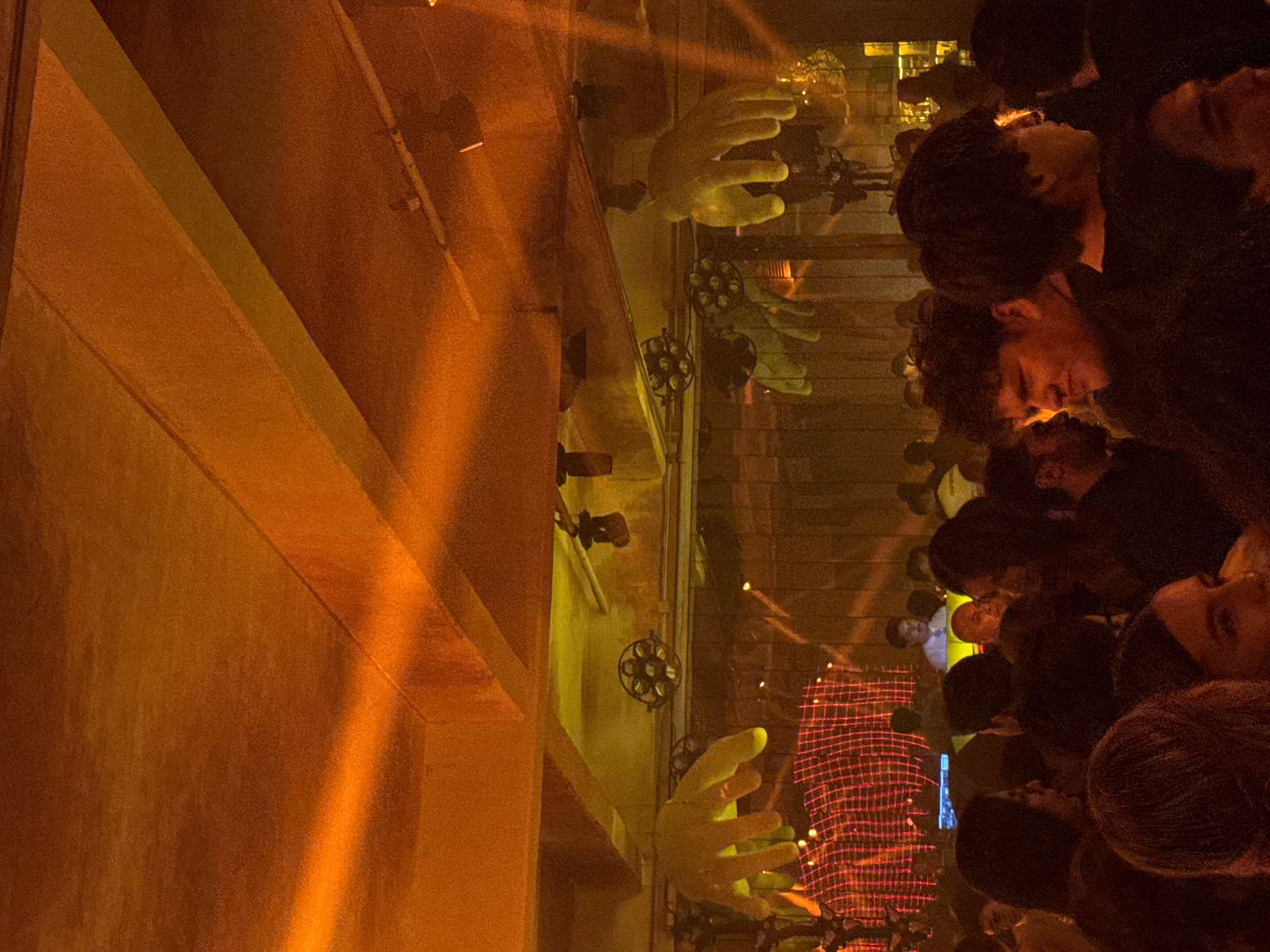 Indoor crowd event captured in Tlaxcalancingo, Mexico