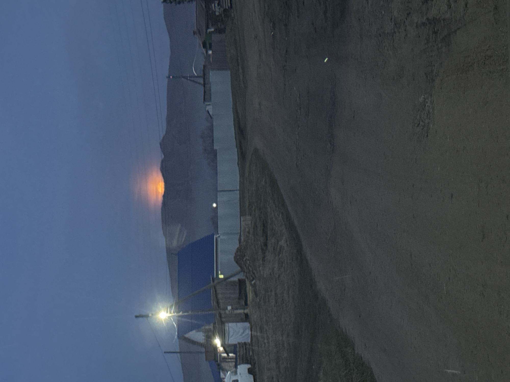 Rural twilight landscape documented by single witness