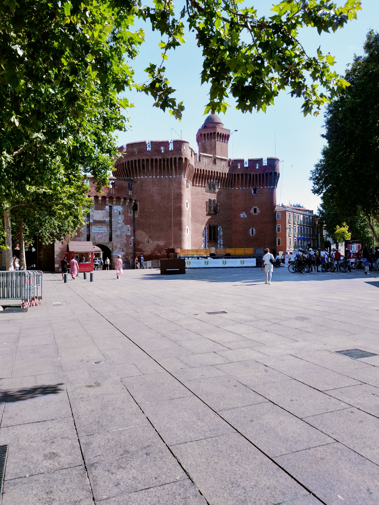 Sunny afternoon in Perpignan's old town streets and plazas