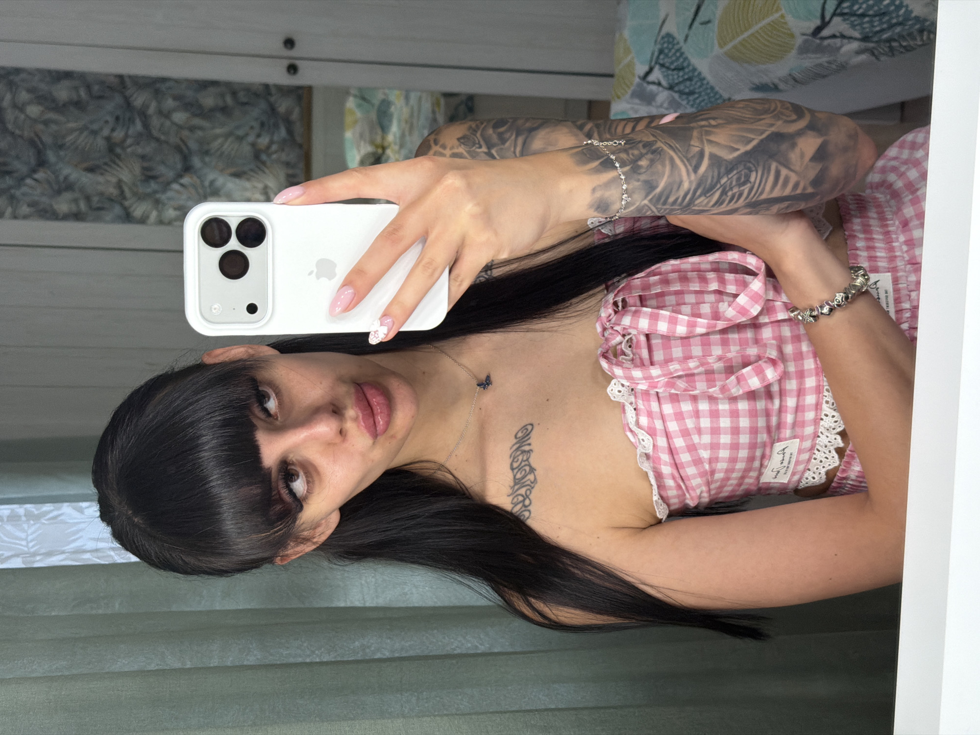 Woman documents evening routine with selfies in Plovdiv bedroom