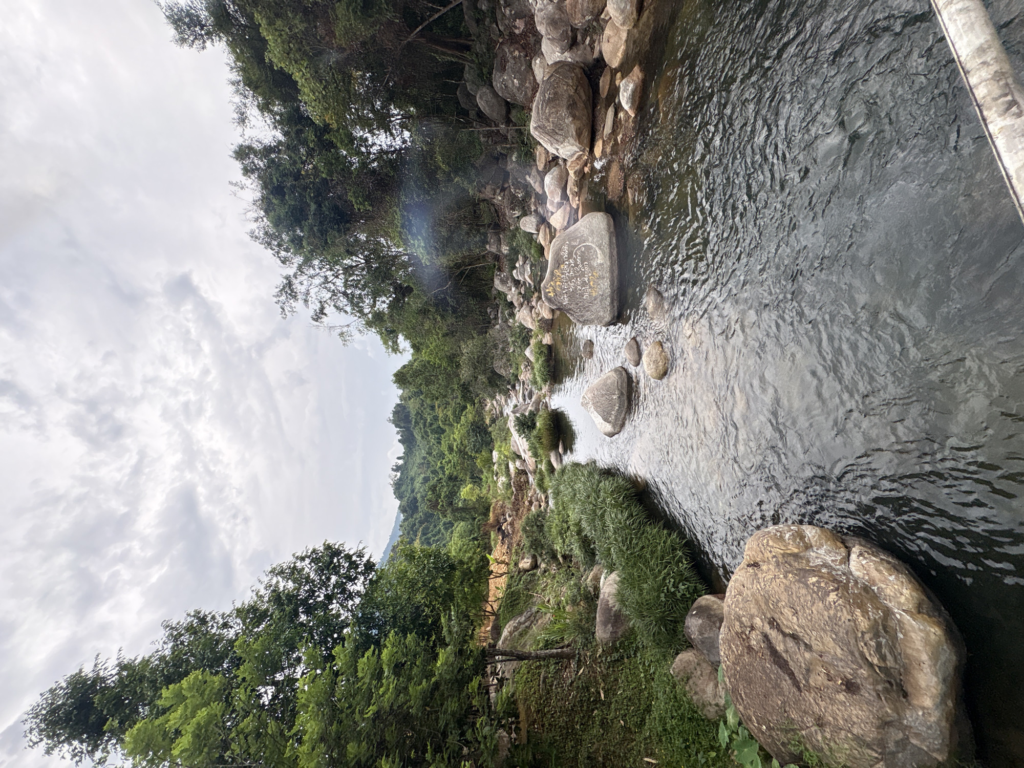 Swimmers enjoy natural pools and waterfalls in Khanh Vinh