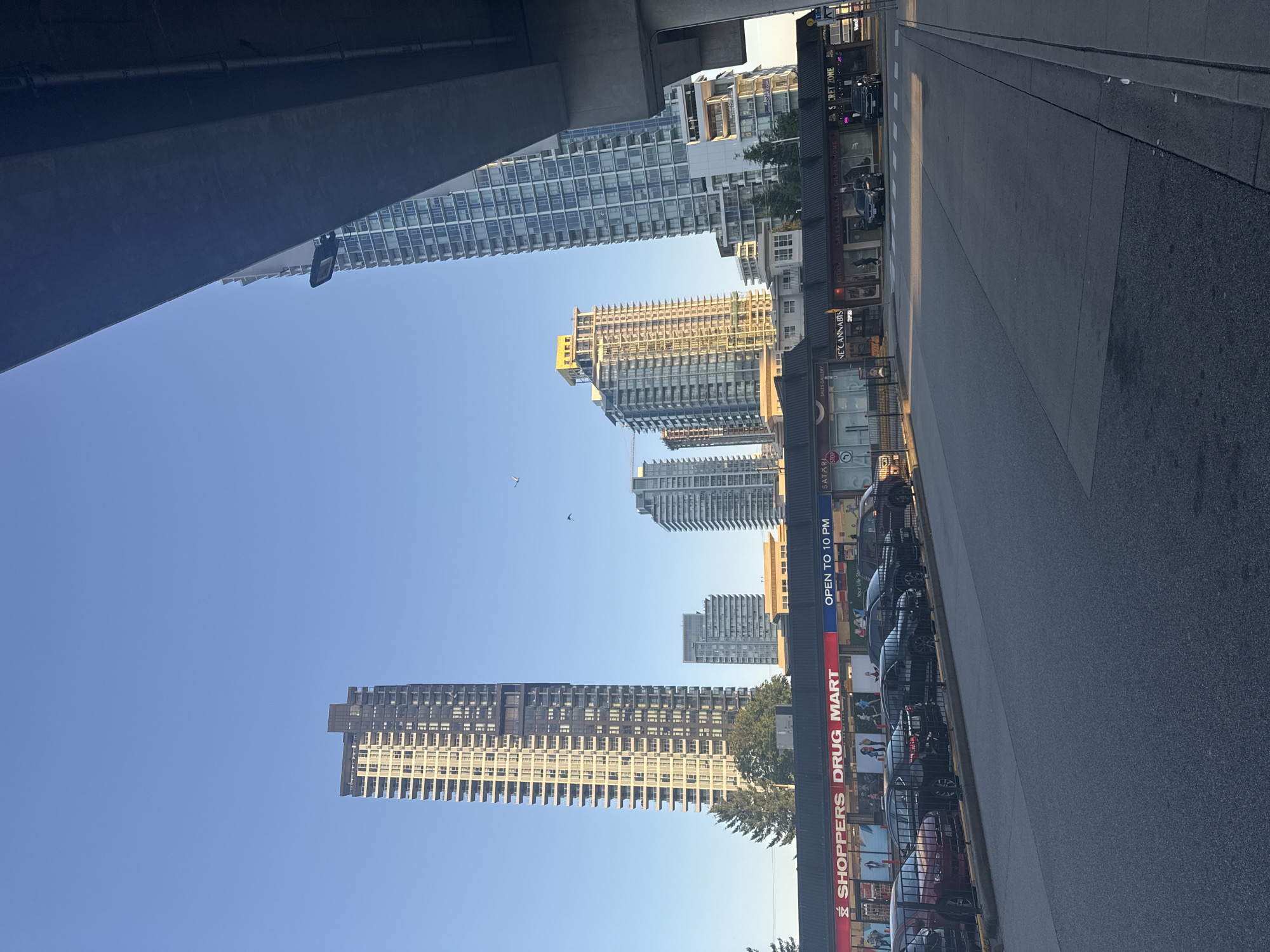 Street-level look at Burquitlam Station and its urban surroundings