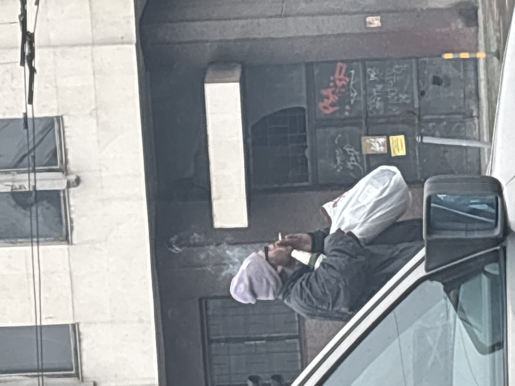 Ordinary afternoon scene at Varna bus stop with waiting passengers