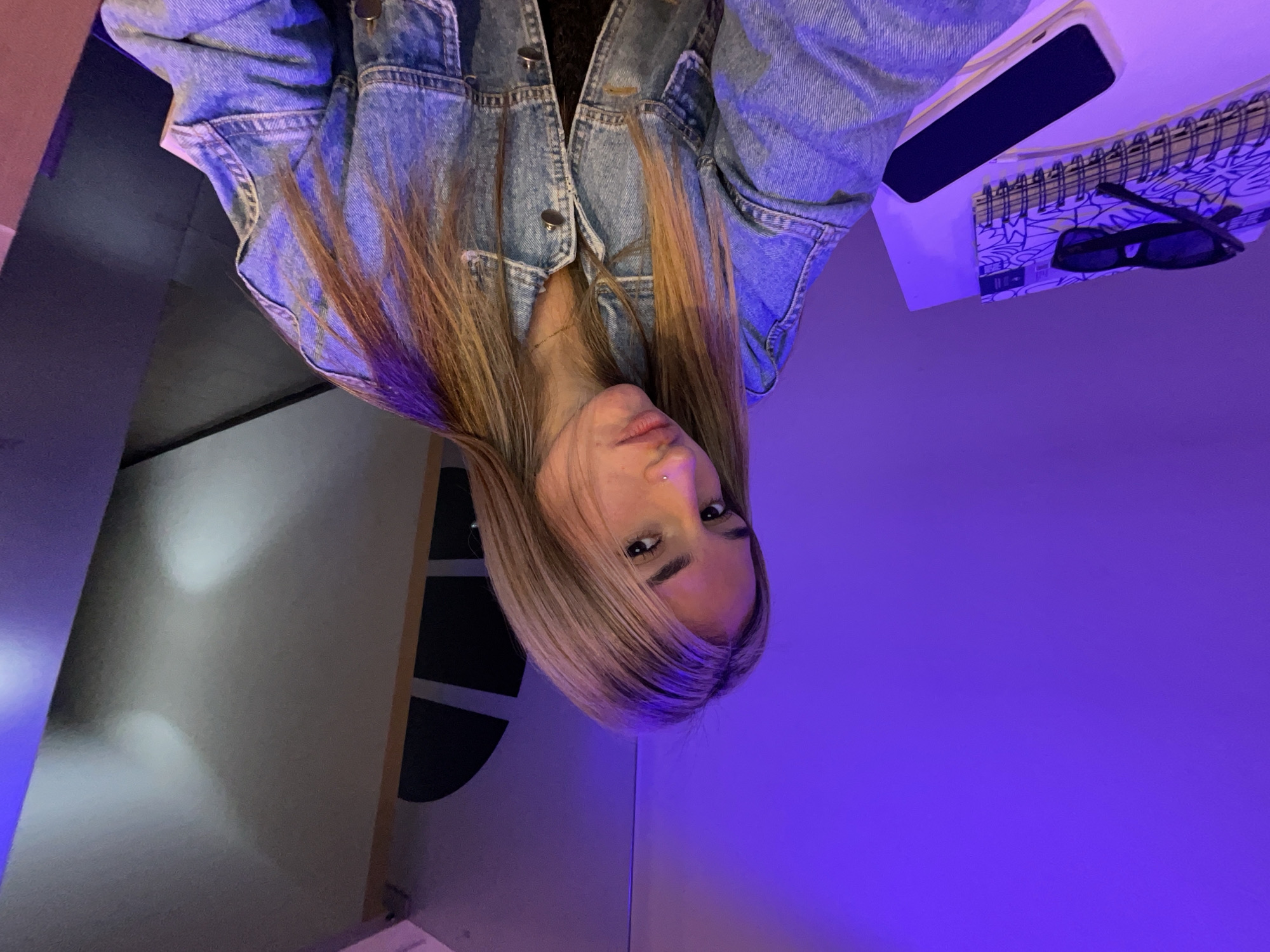 Selfie at a purple-lit desk in Catamarca, Argentina