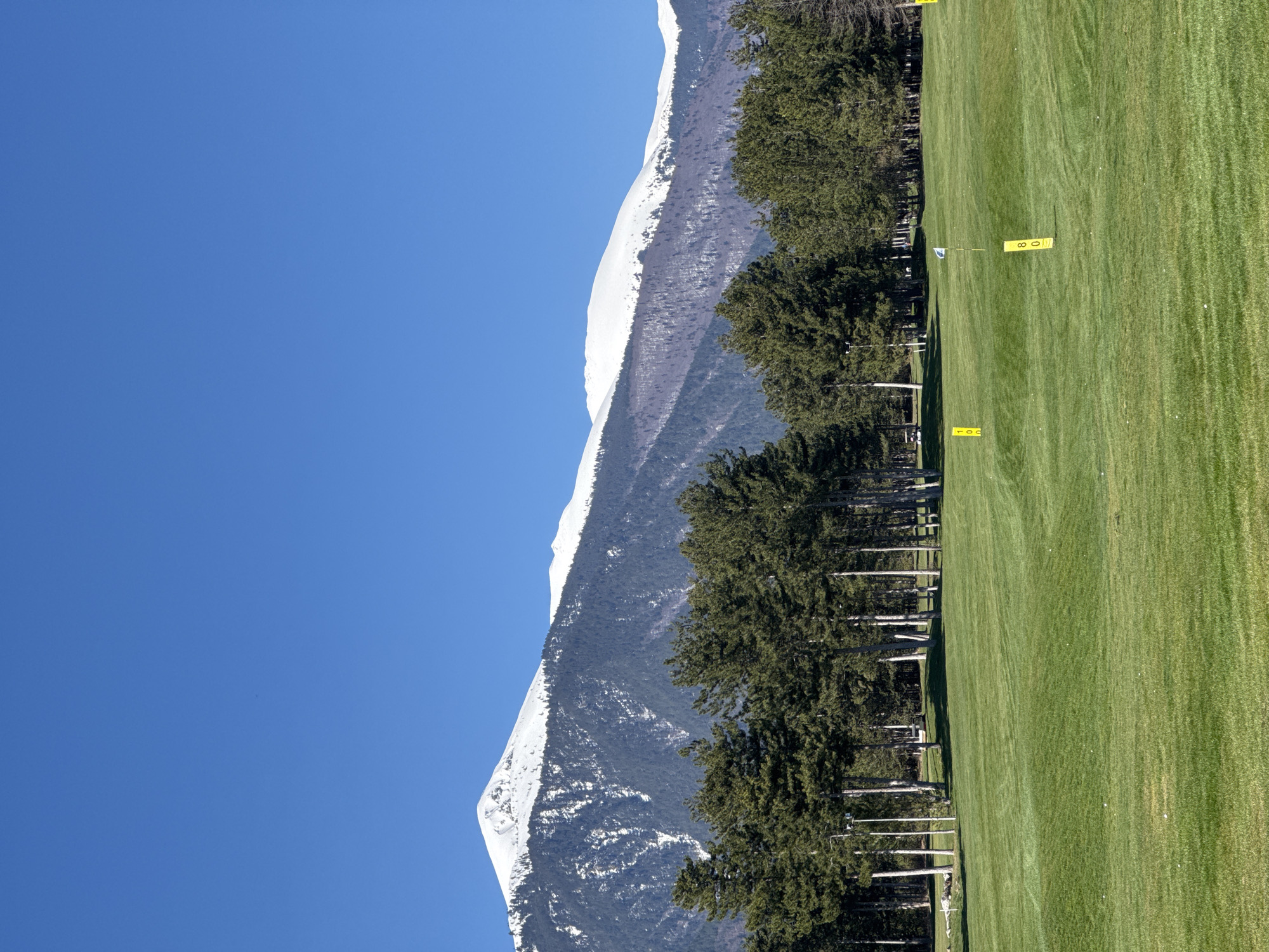 Golf course documented in Razlog, Bulgaria with mountain backdrop