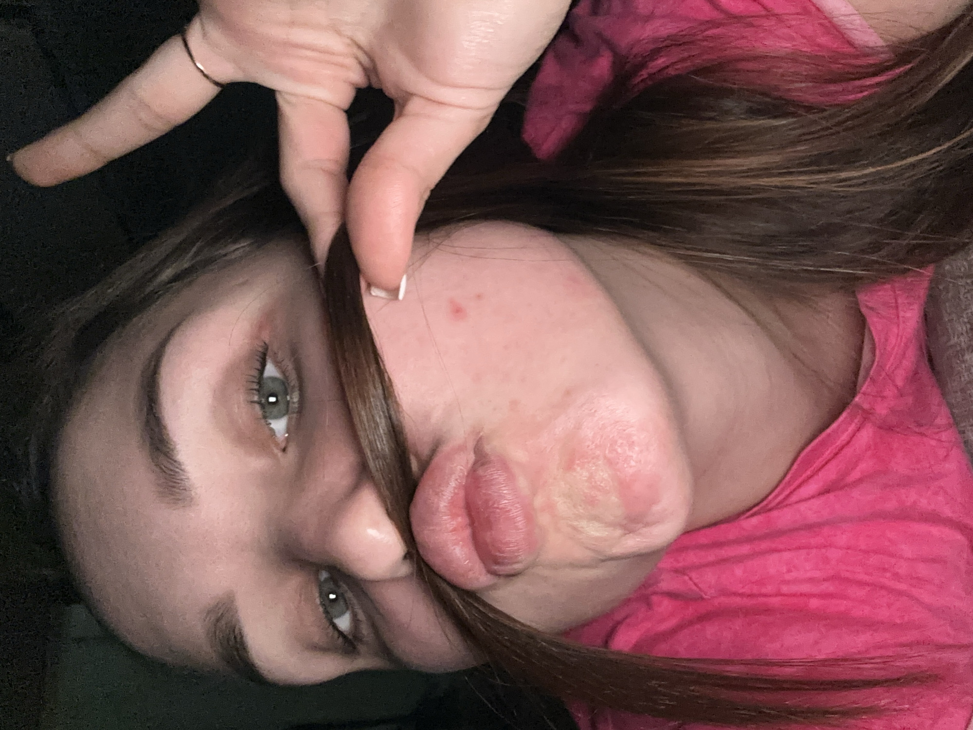 Mother and toddler take playful selfies in Chaikovsky home
