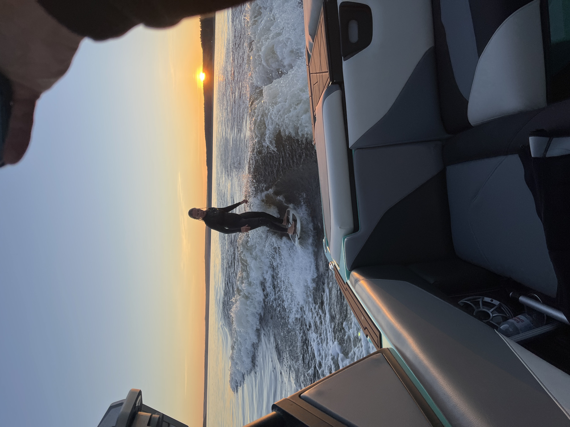 Sunset wakeboarding on a lake outside Gromovo, Russia