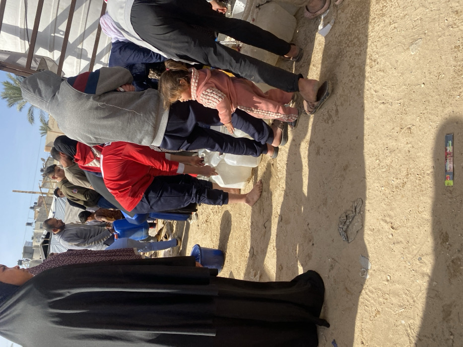 Water Distribution Draws Crowds in Deir el-Balah