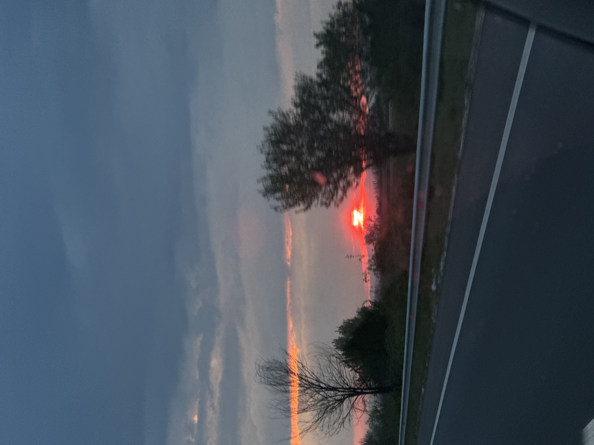 Vibrant sunset observed from roadside in Malo Konare, Bulgaria