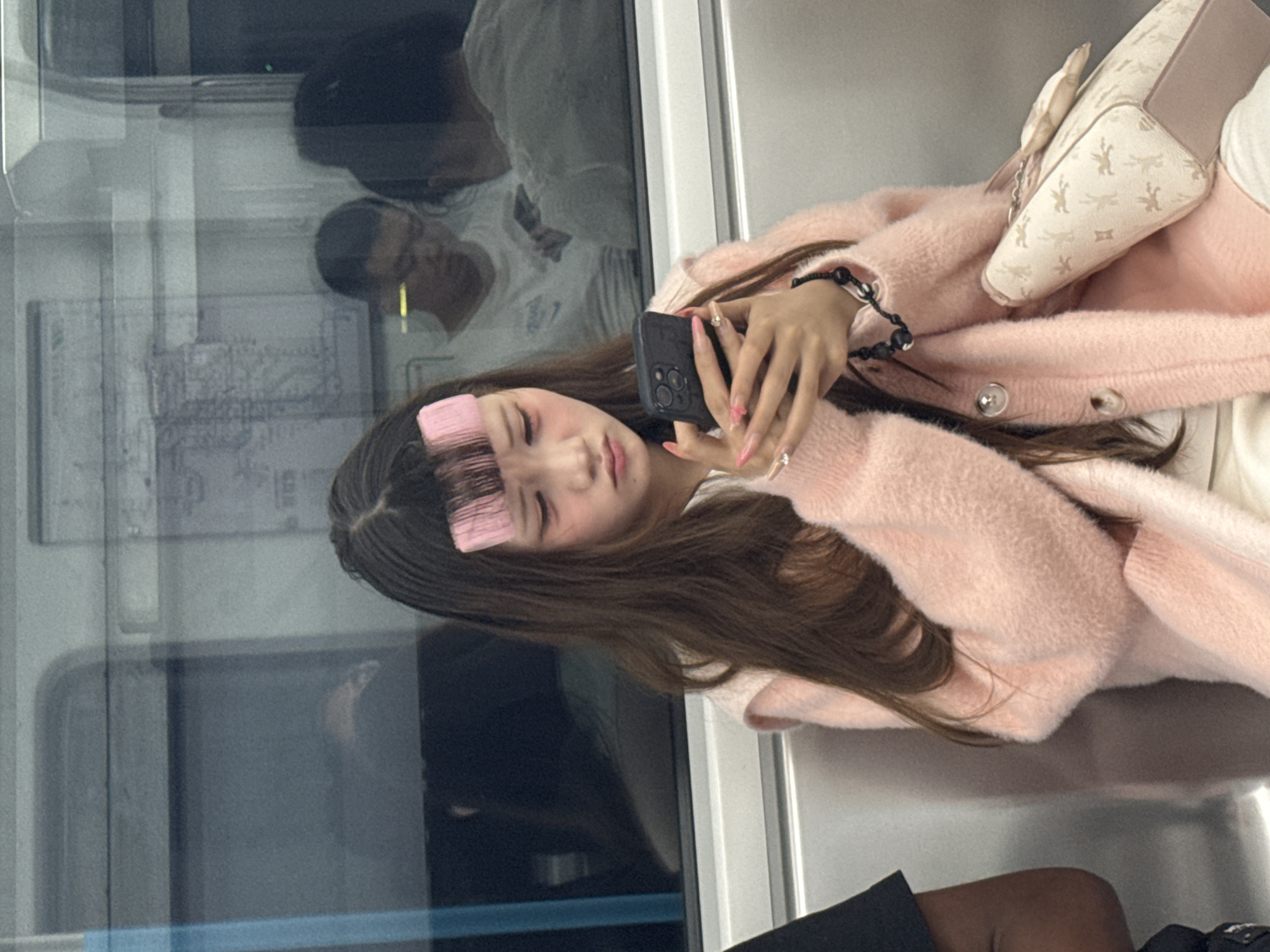 Woman takes selfie on subway train in Tiaodeng