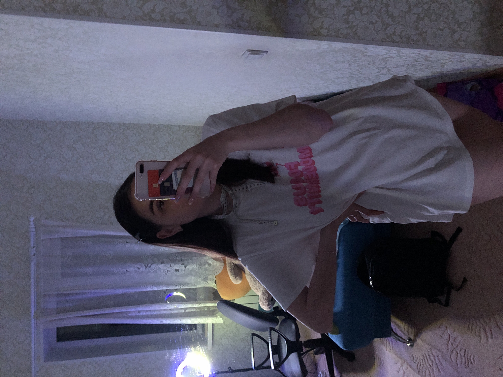 Woman takes selfies in room in Noviy, Russia