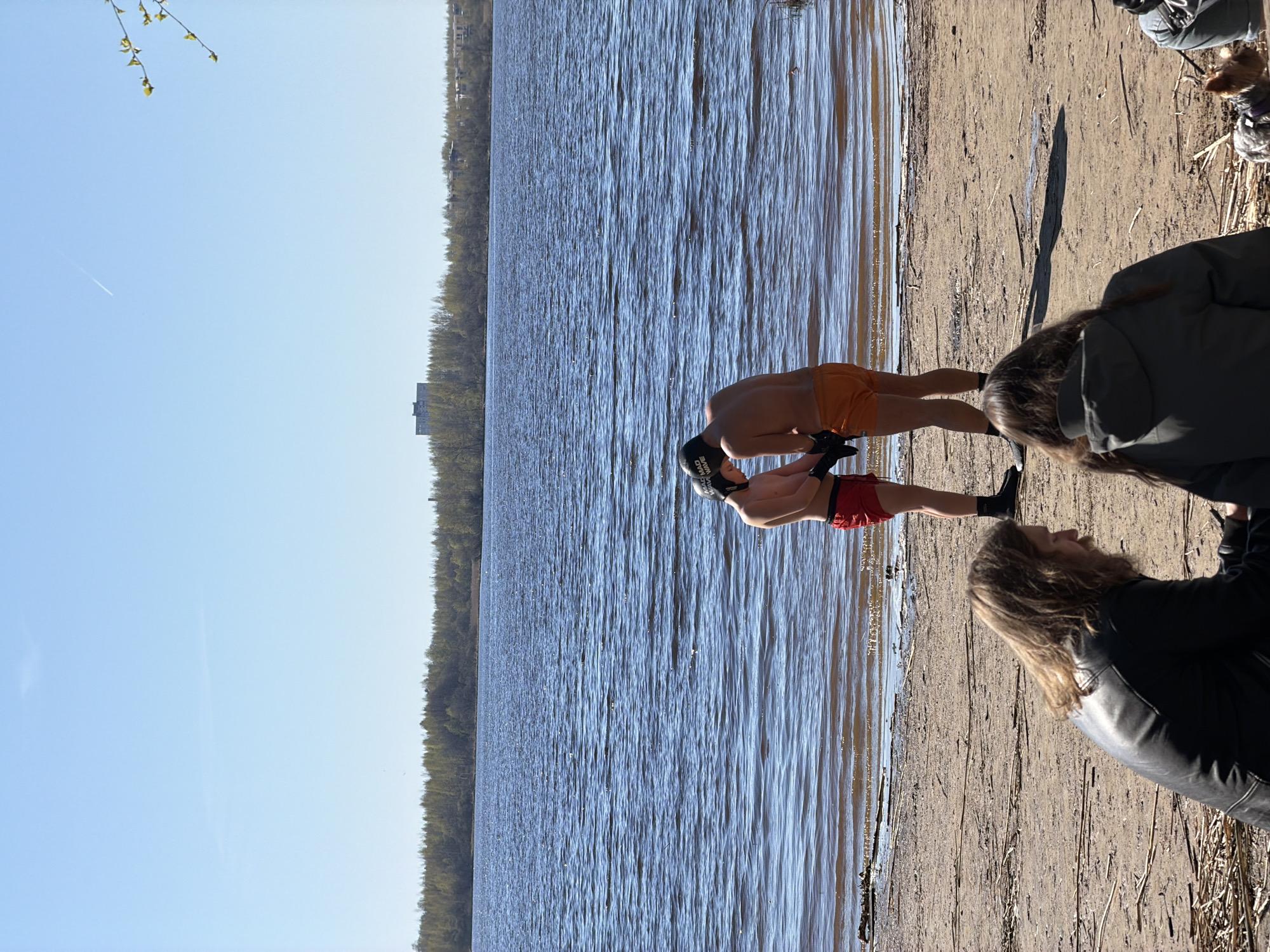Swimmers enjoy sunny beach day in Saint Petersburg