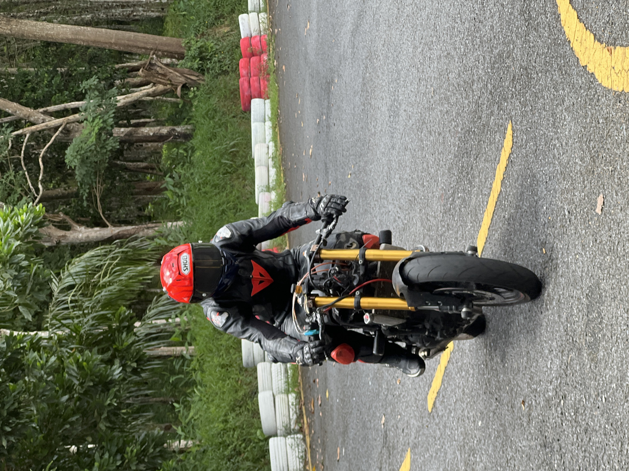 Motorcycle track session at a go-kart circuit in Thep Krasatti