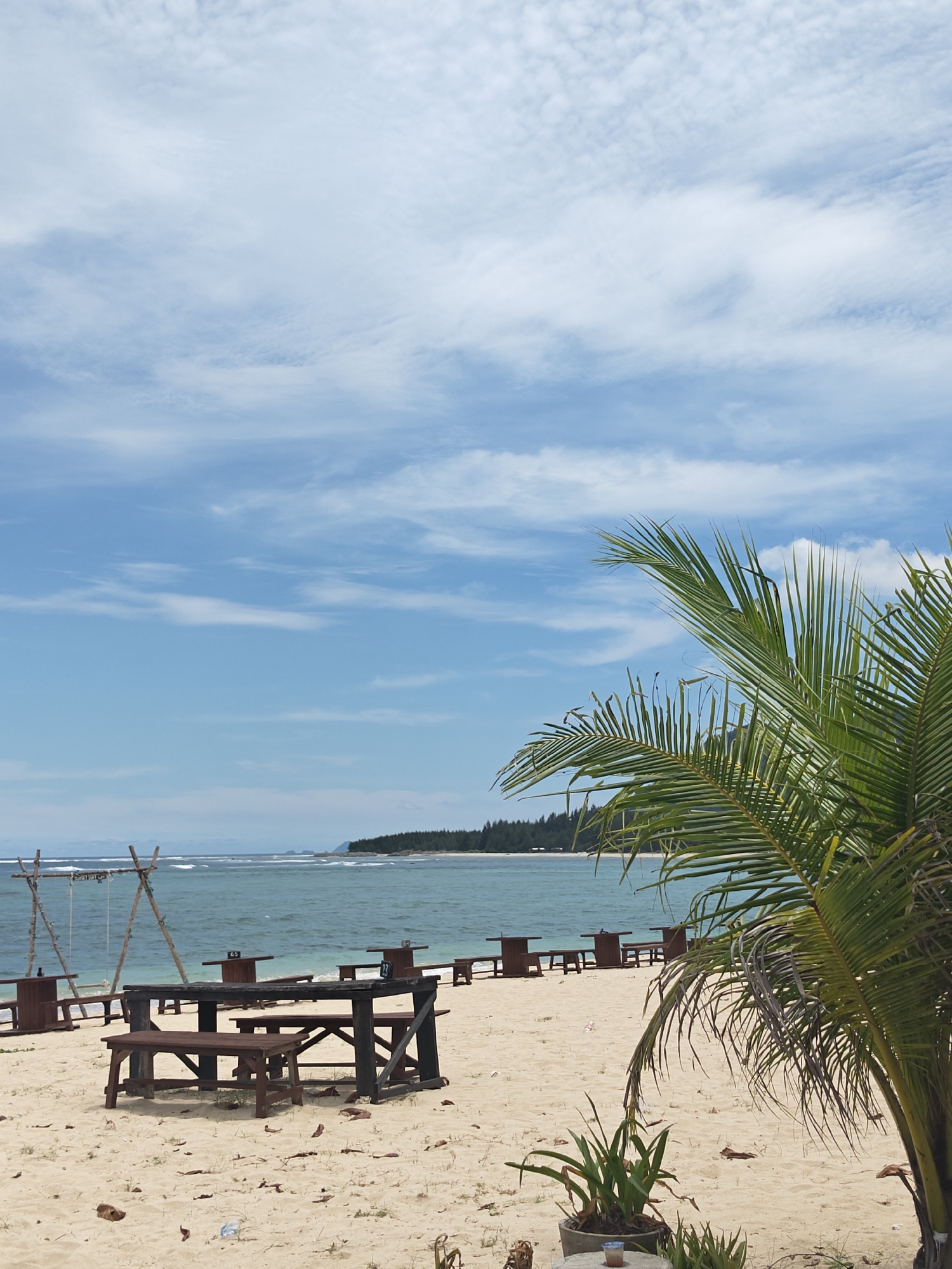 Beach picnic setup documented in Monikeun, Indonesia