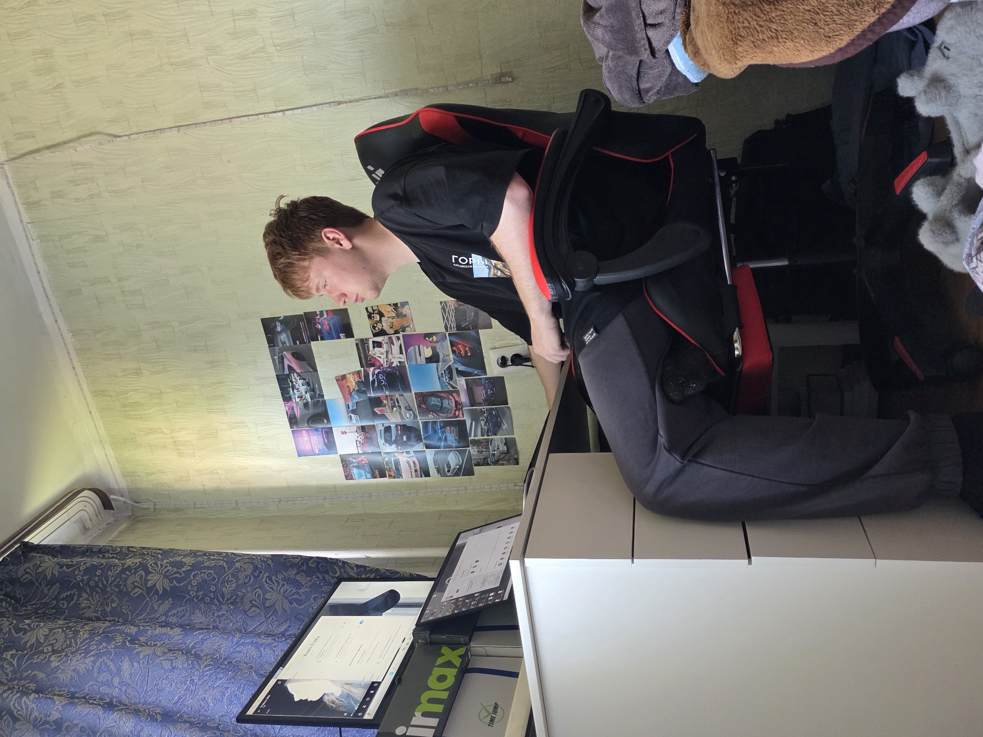 Casual hangout in a Chita bedroom, gaming setup in the background