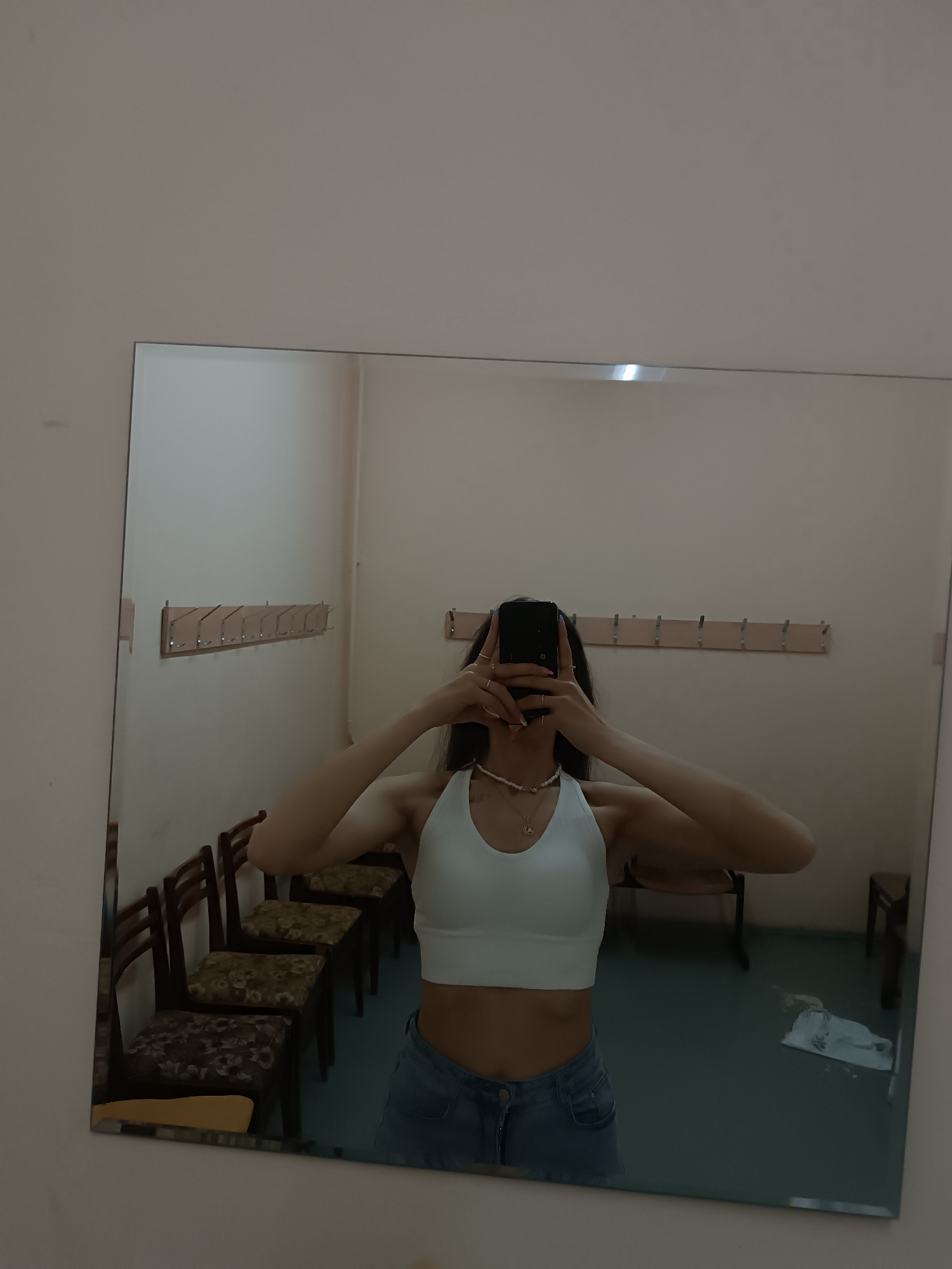 Woman Takes Series of Mirror Selfies in Dressing Room