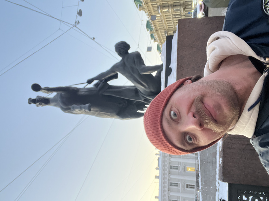 Tourist documents winter walk through historic Saint Petersburg landmarks