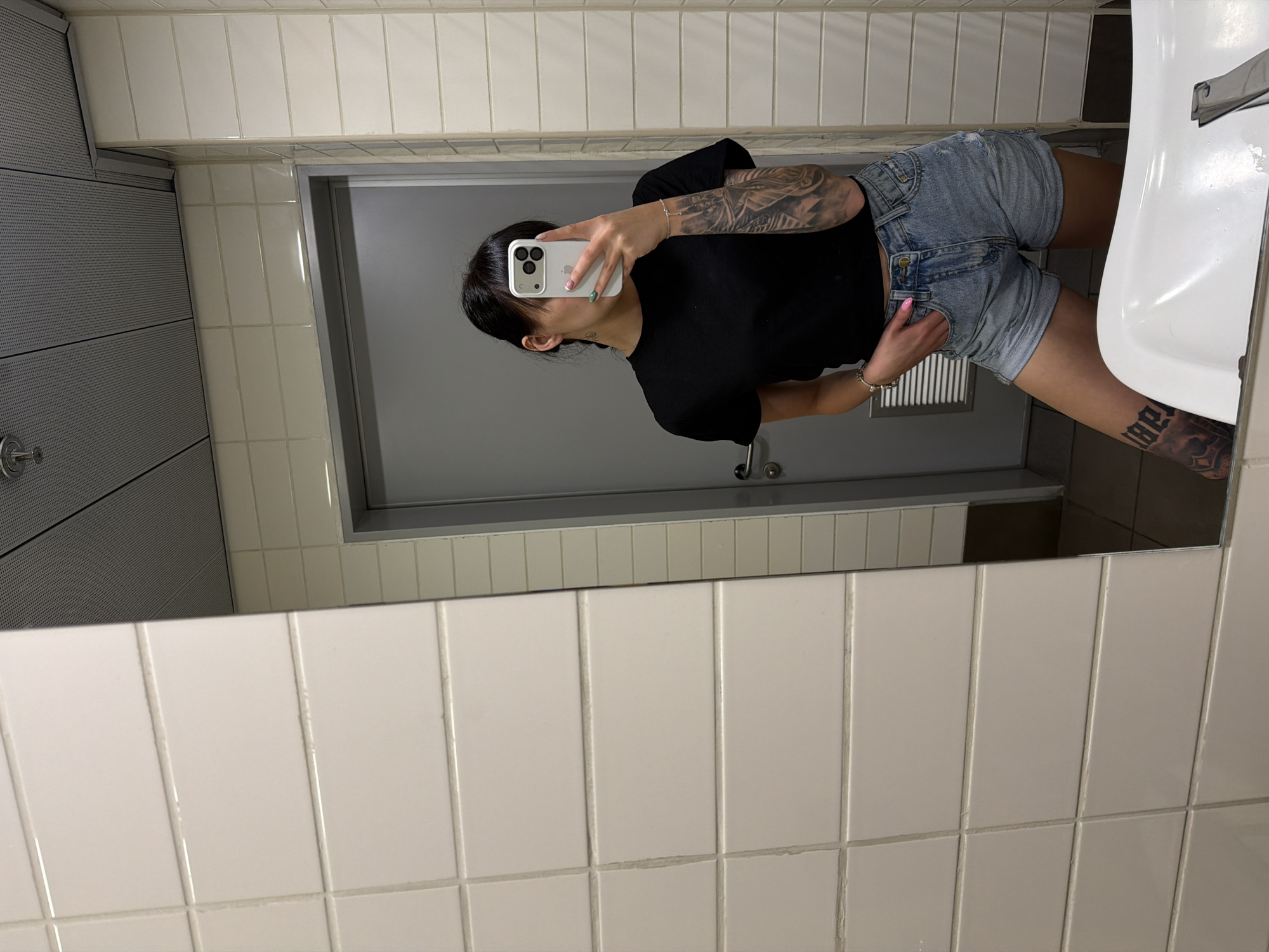 Mirror selfie taken in Plovdiv public restroom
