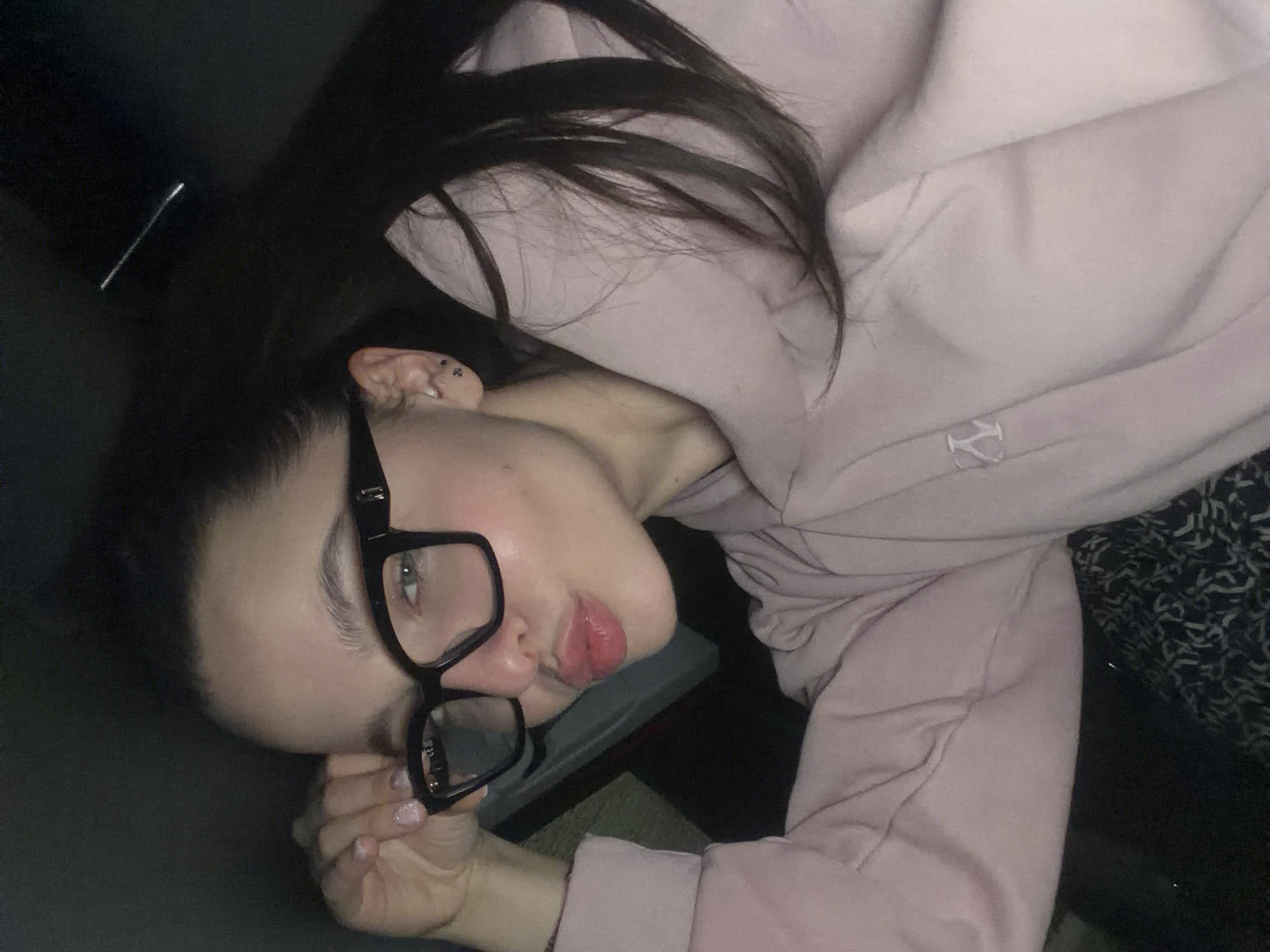 Woman takes multiple selfies in Pernik, Bulgaria