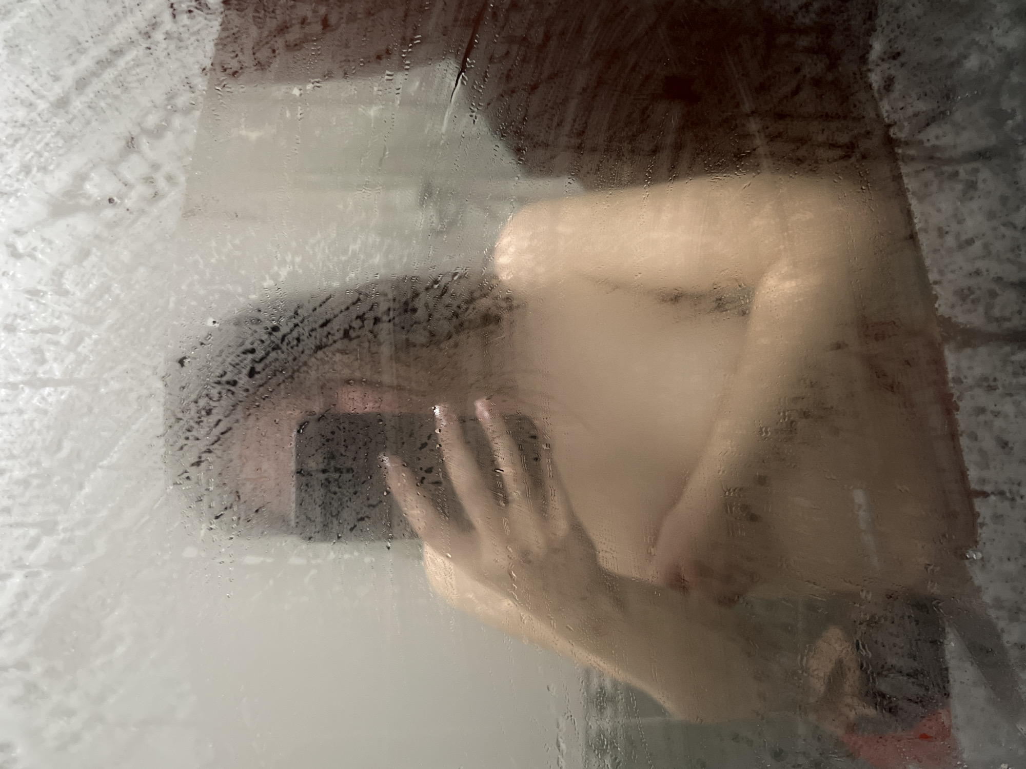 Evening domestic moments: shower time and sleeping cat