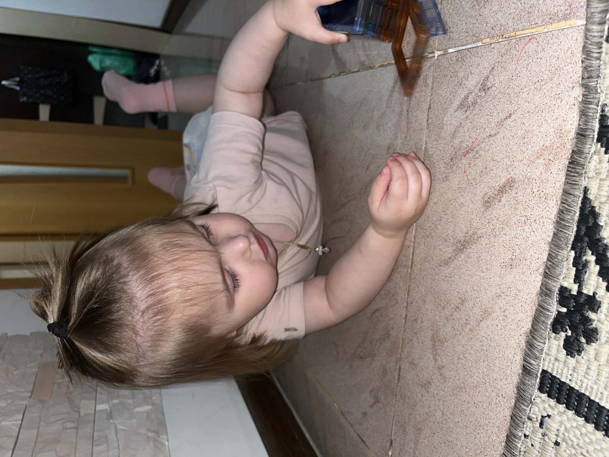 Toddler playtime snapshots from a home in Novokuybyshevsk