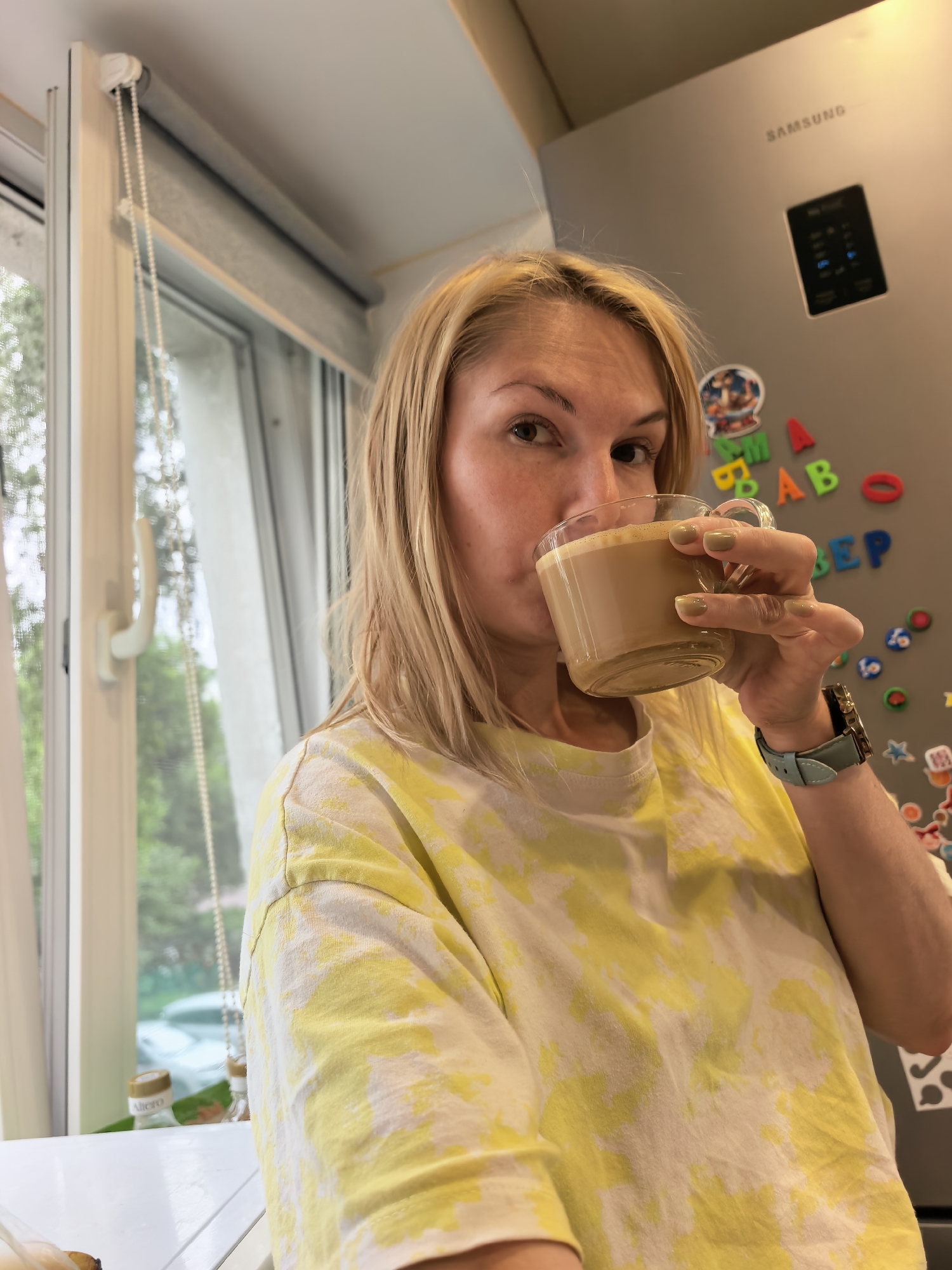 Coffee and a baby: a quiet morning at home in Sterlitamak