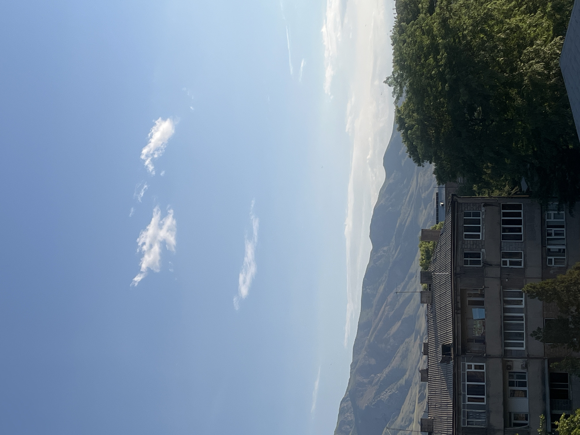 Sunny afternoon rooftop views across Gladzor, Armenia