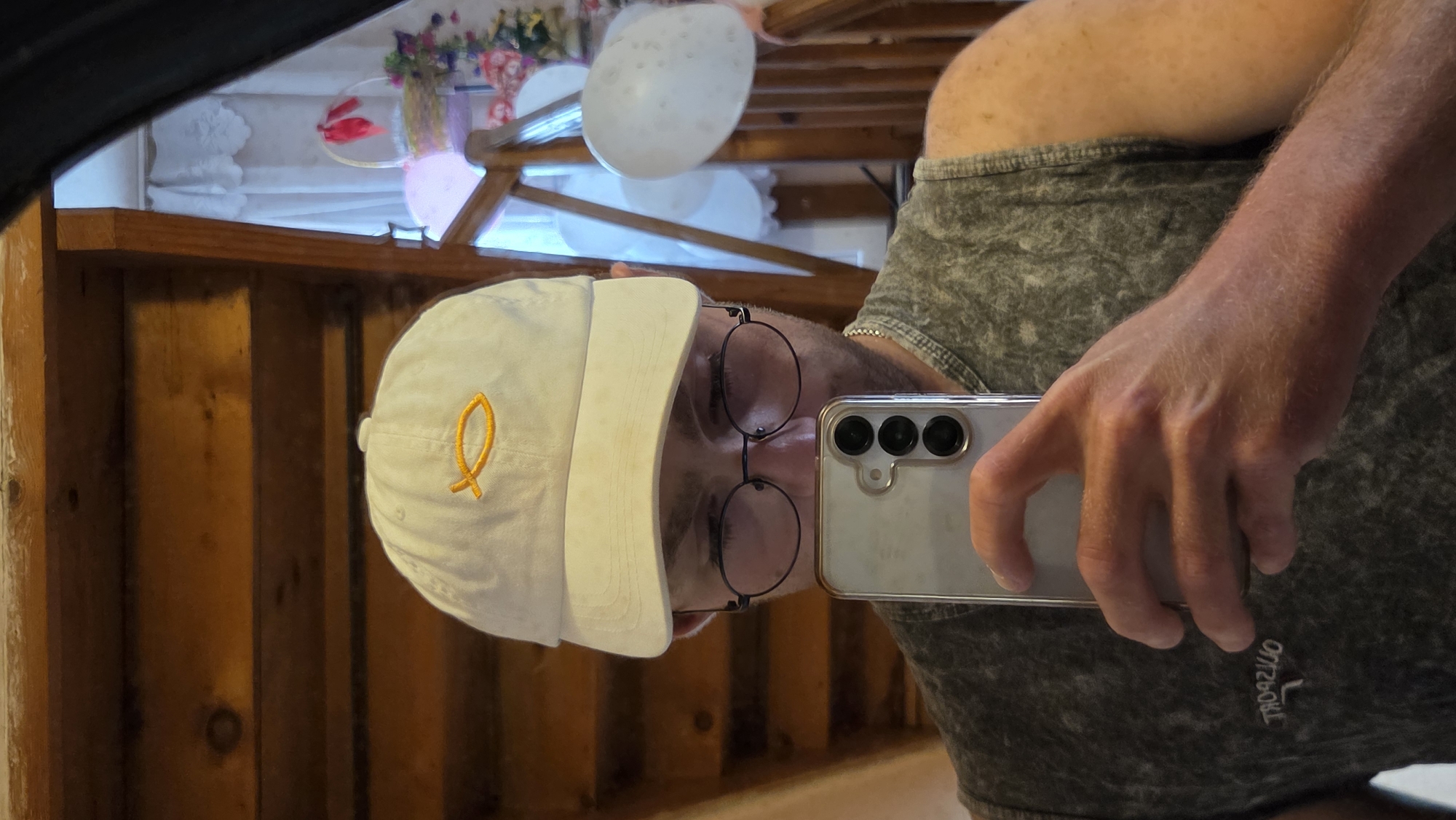 Person takes mirror selfie in Bania, Bulgaria