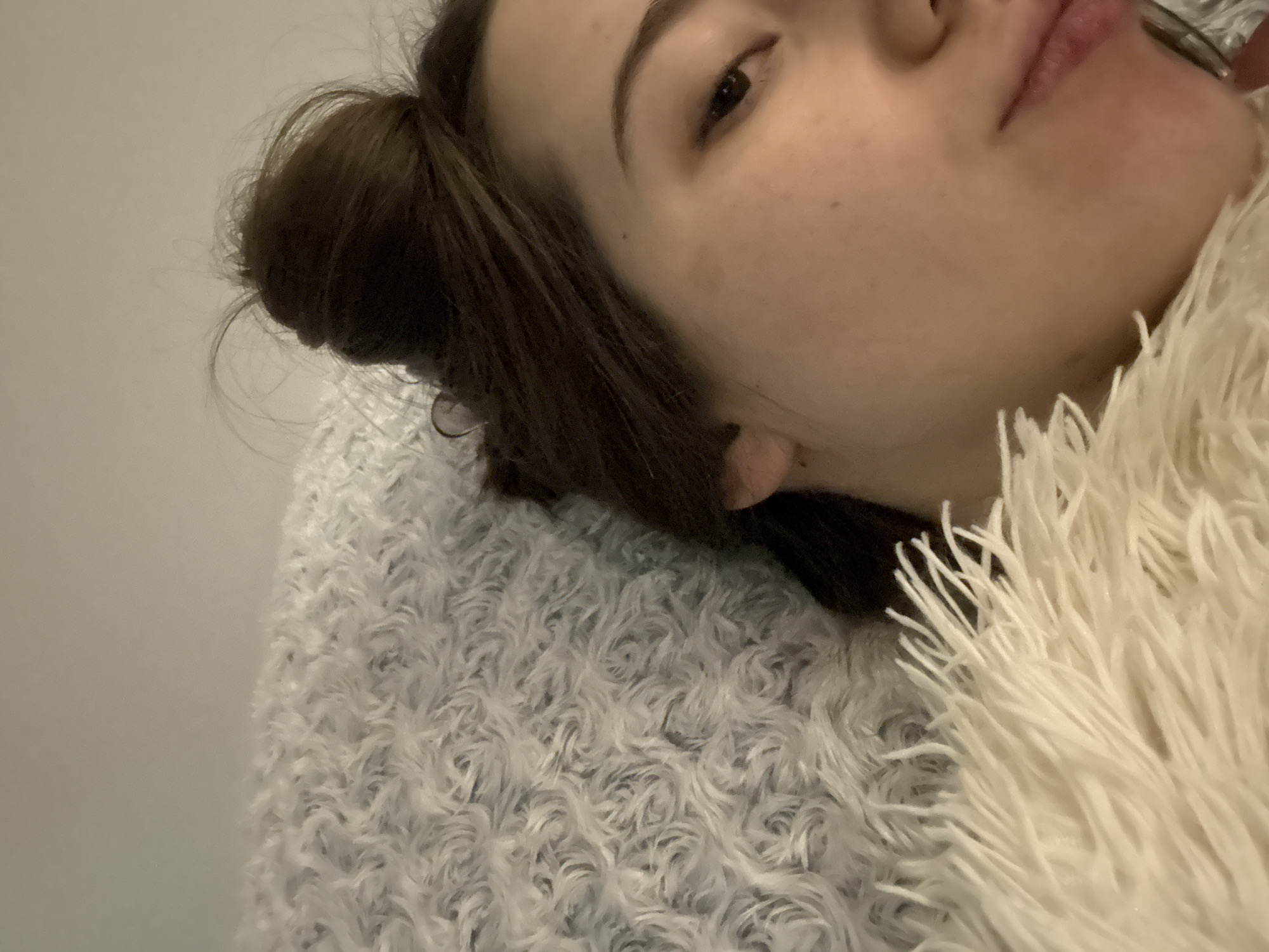 Person resting with pillow and blanket in Sofia