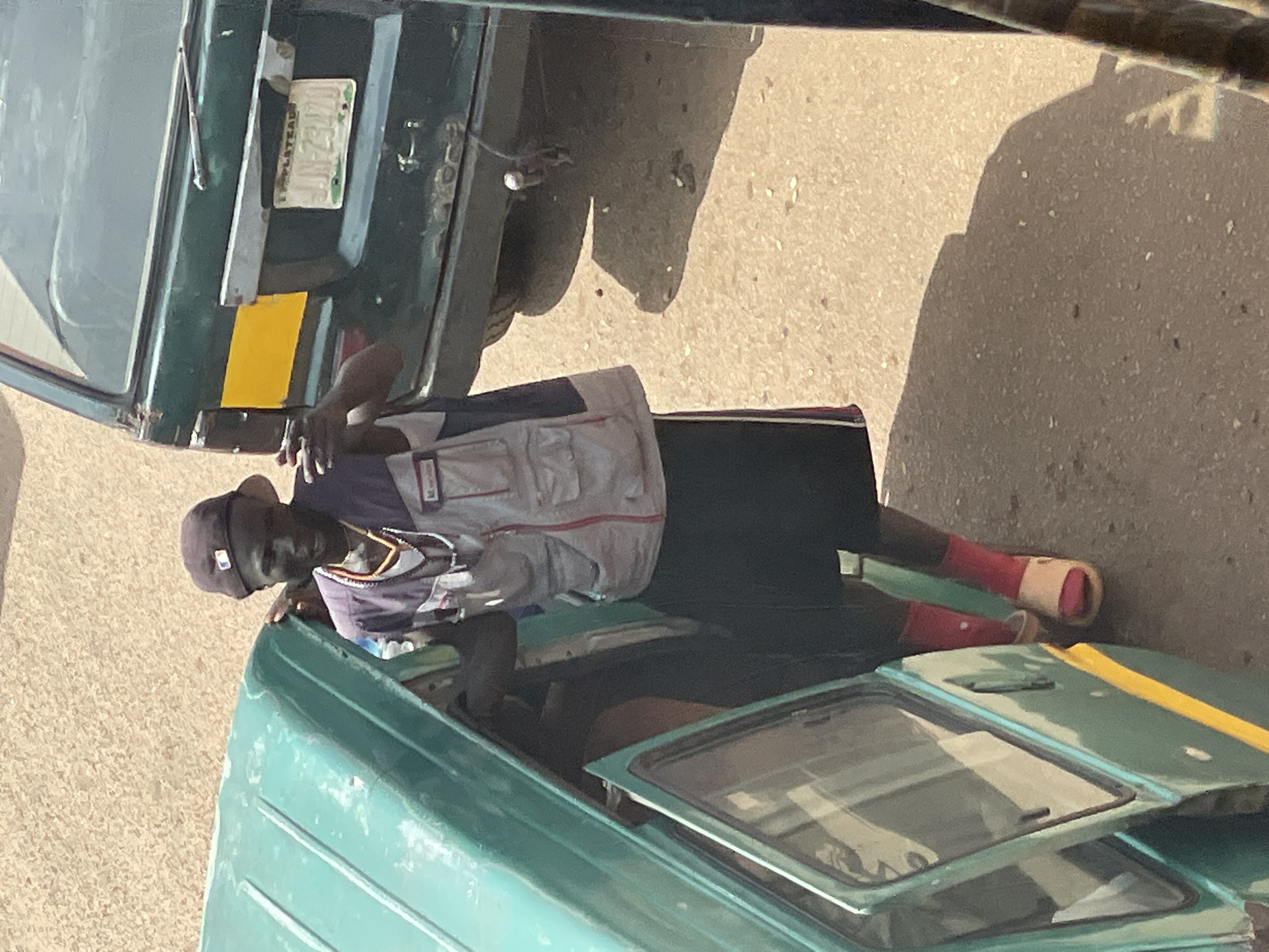 Everyday street life and commerce in a busy African urban setting