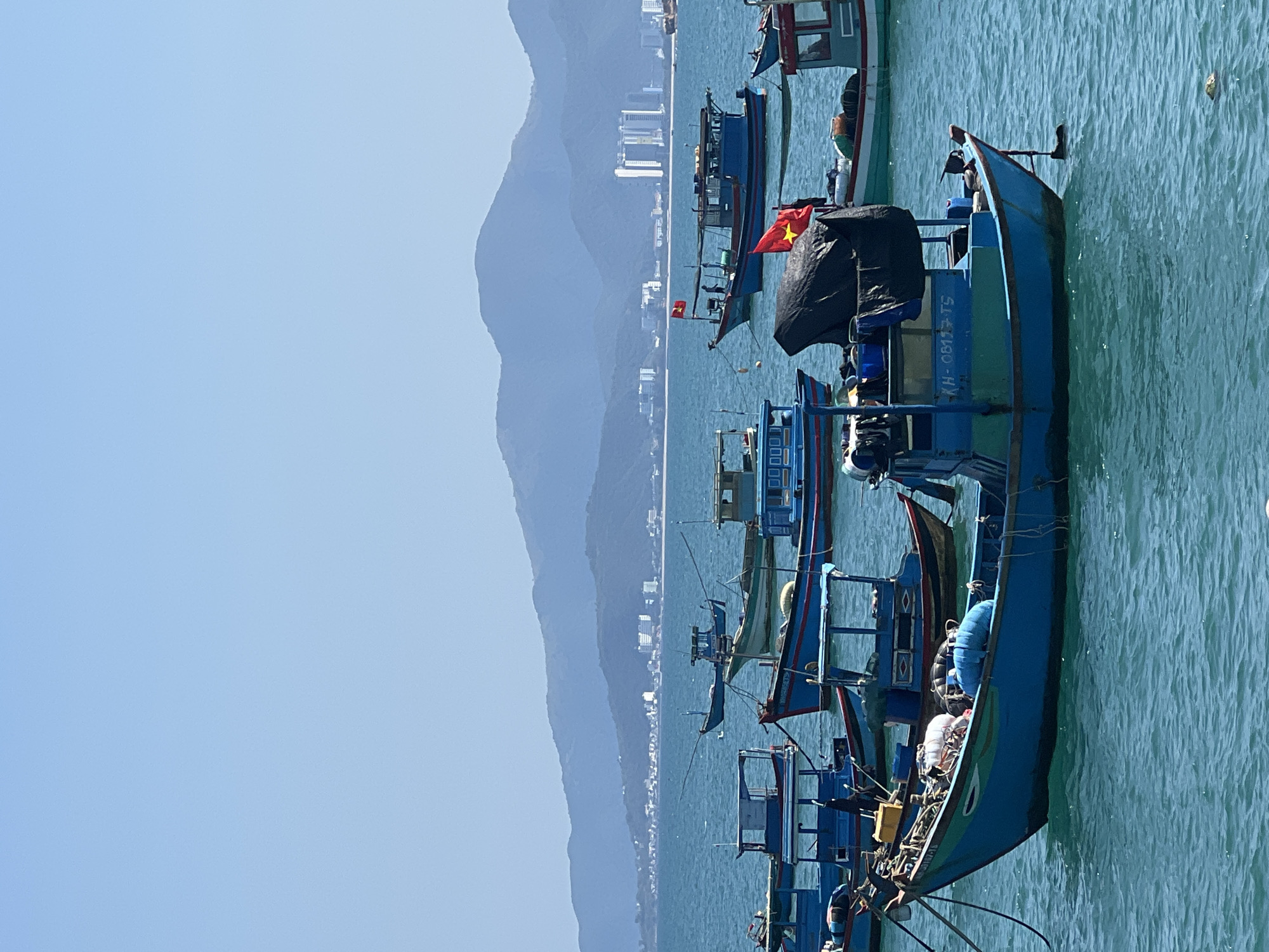 Morning scenes documented across Nha Trang harbor and coastline