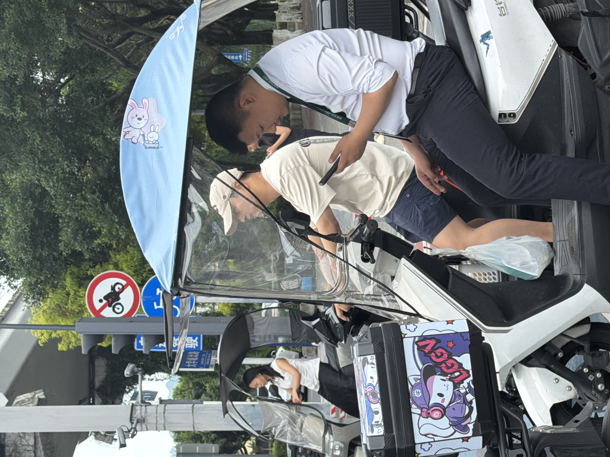 Early morning electric scooter activity in Chongqing tech district